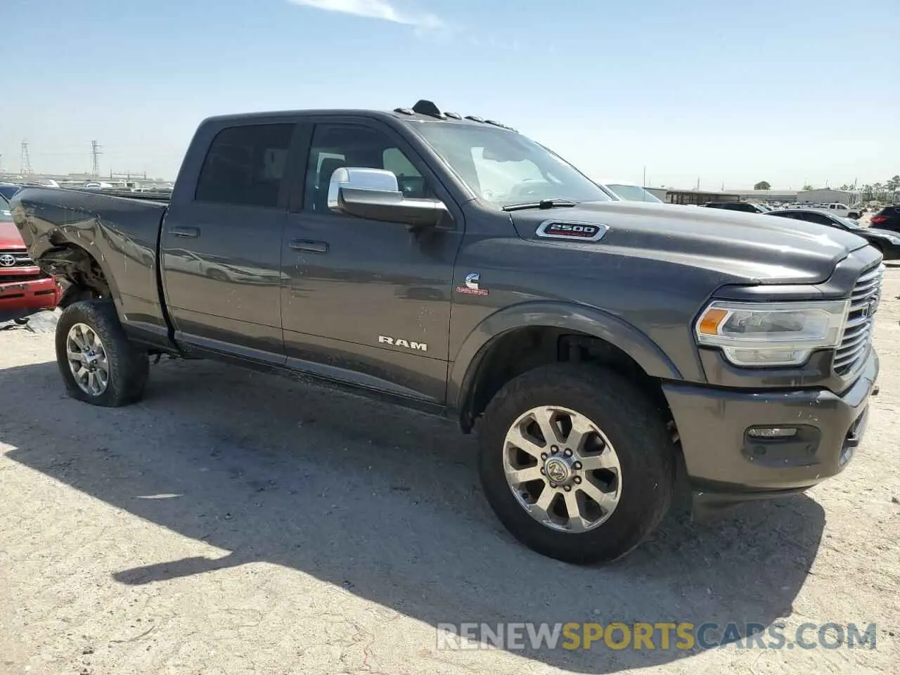4 Photograph of a damaged car 3C6UR5FL5KG652706 RAM 2500 2019