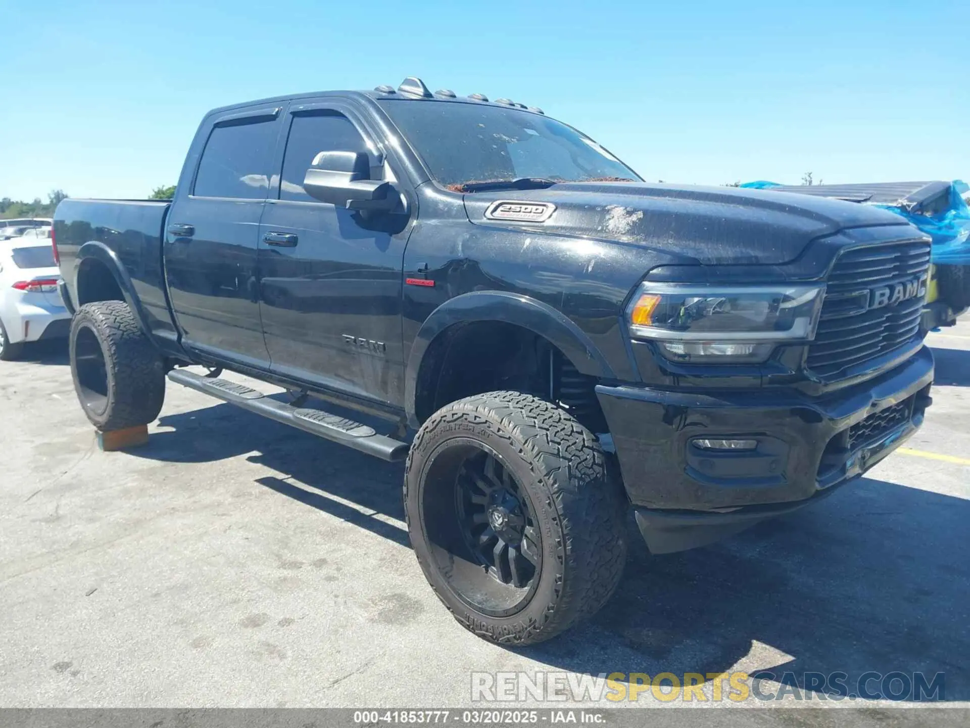 1 Photograph of a damaged car 3C6UR5FLXKG710325 RAM 2500 2019