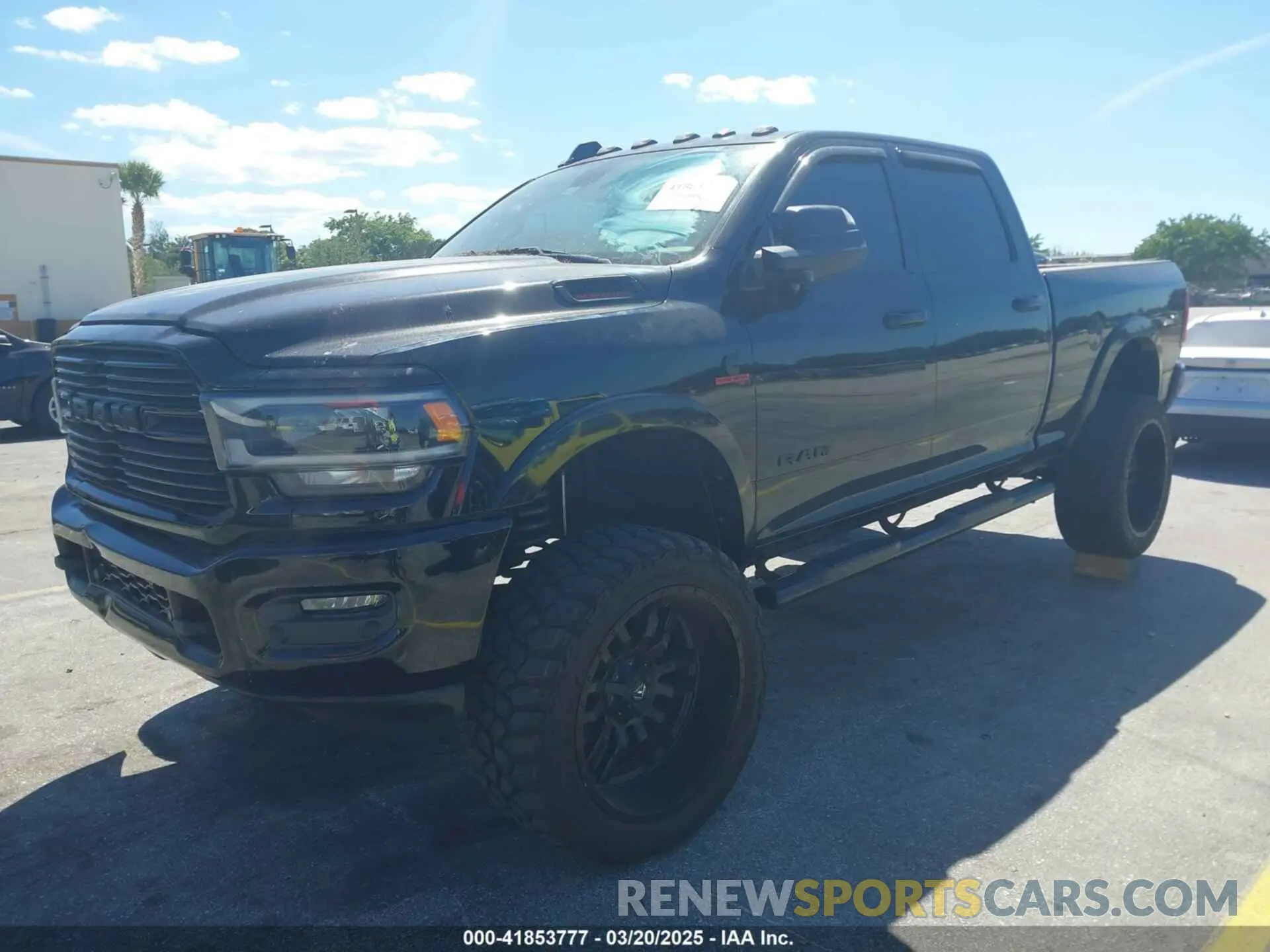 2 Photograph of a damaged car 3C6UR5FLXKG710325 RAM 2500 2019