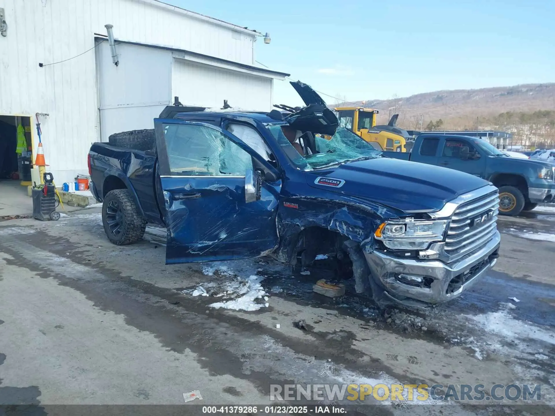 1 Photograph of a damaged car 3C6UR5GJ9KG683082 RAM 2500 2019