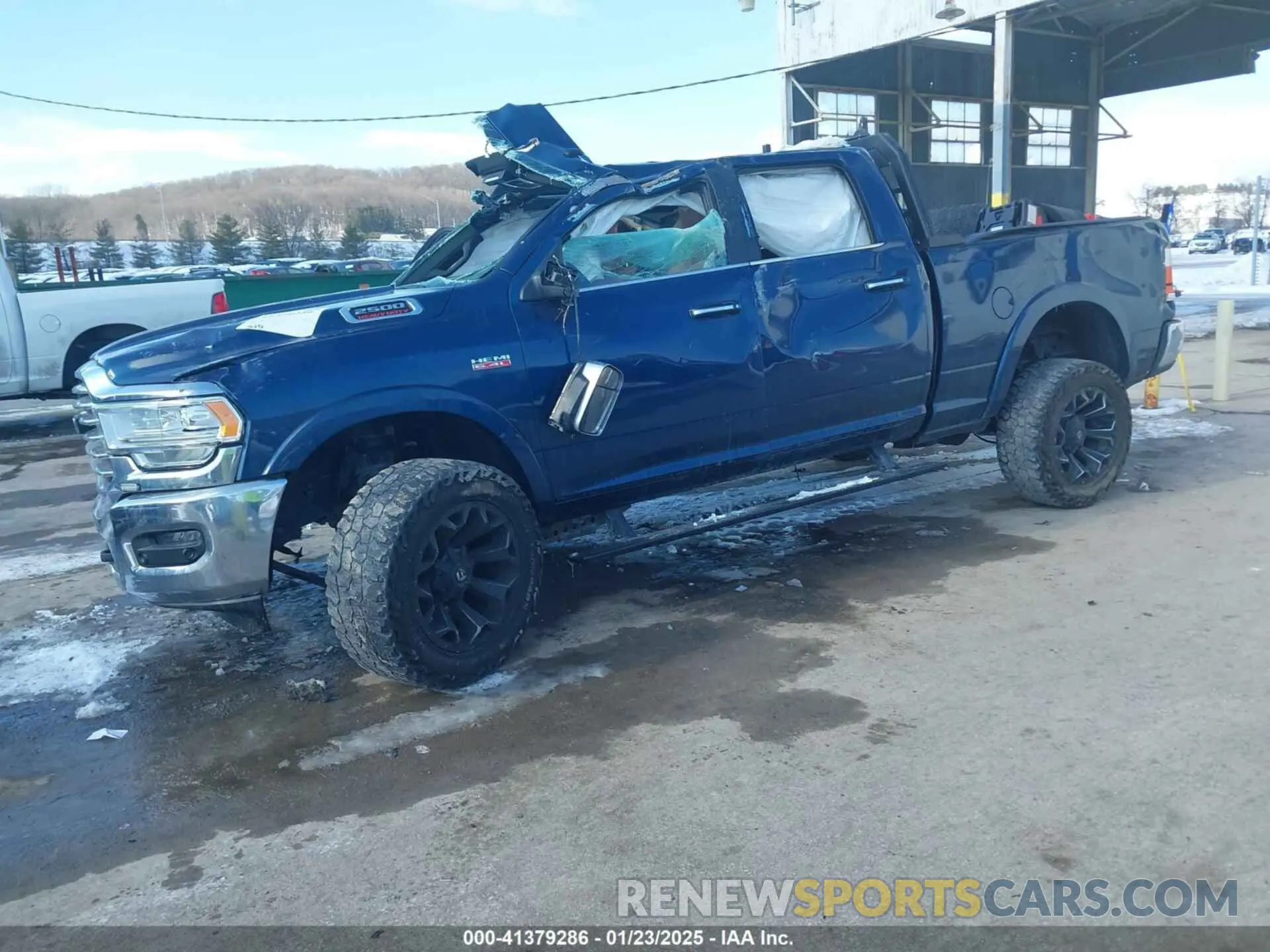 2 Photograph of a damaged car 3C6UR5GJ9KG683082 RAM 2500 2019