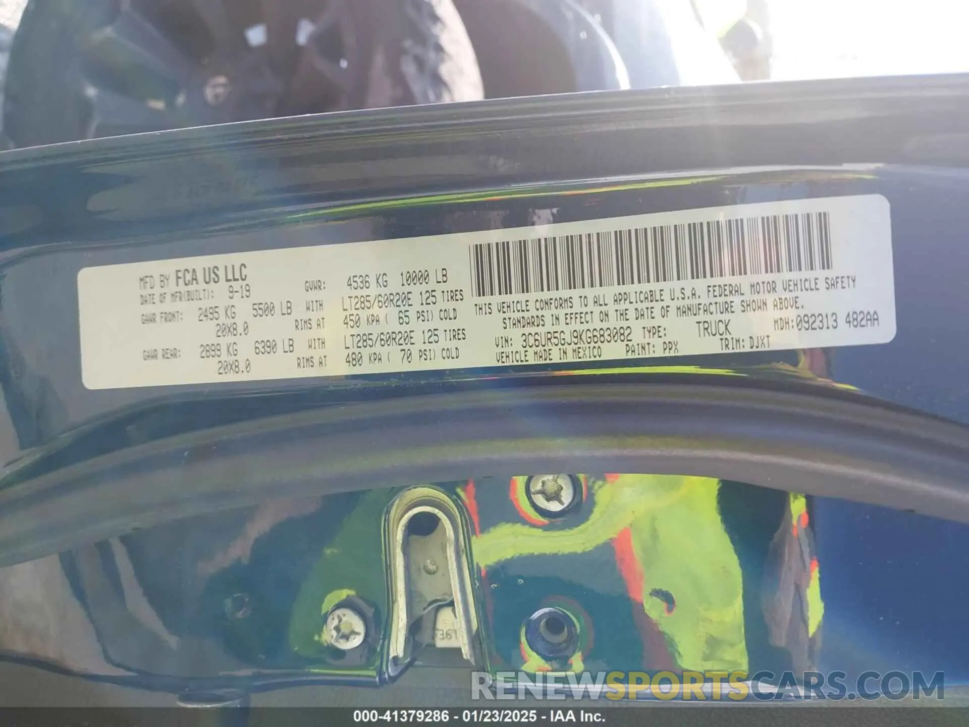 9 Photograph of a damaged car 3C6UR5GJ9KG683082 RAM 2500 2019