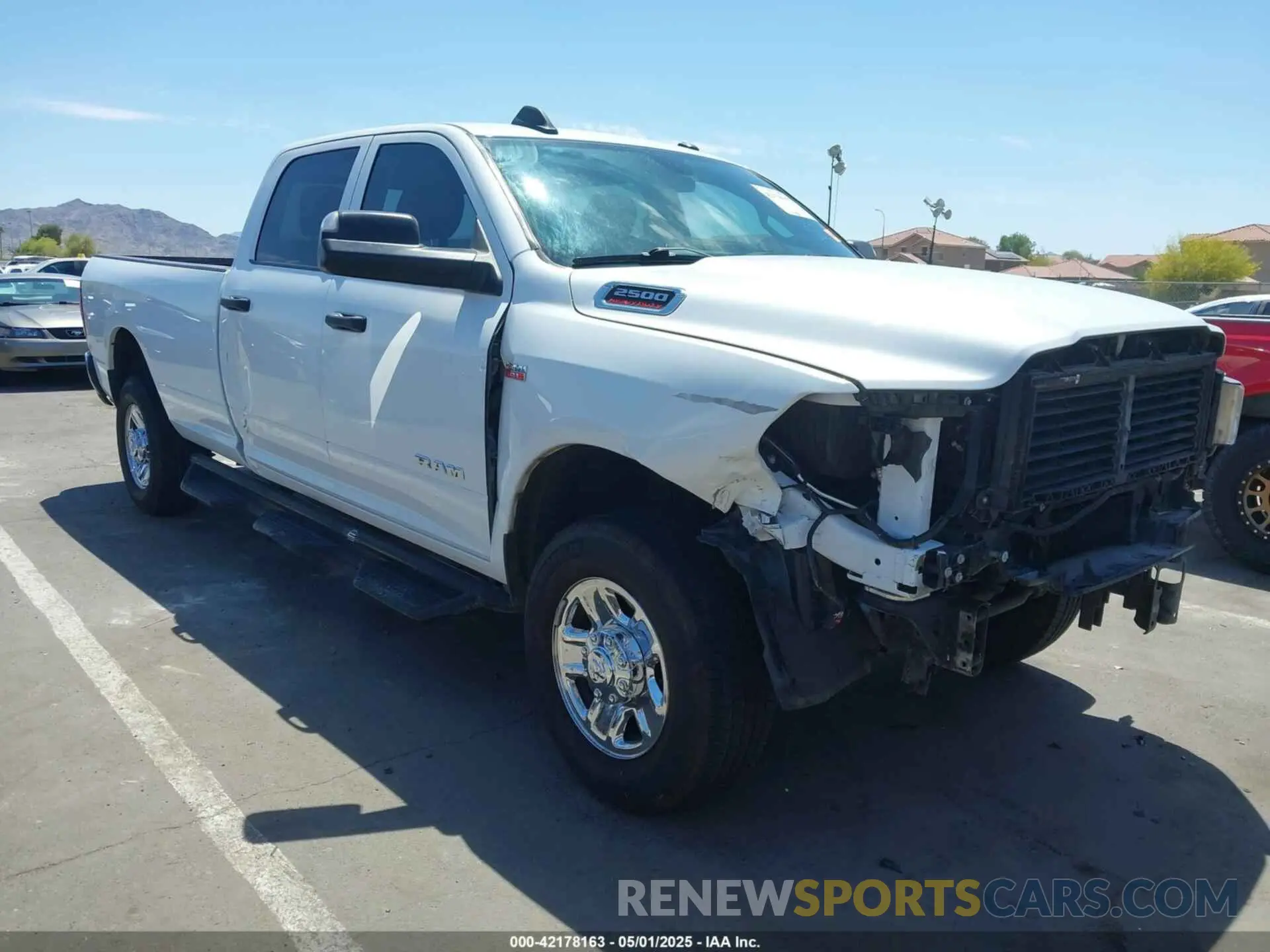 1 Photograph of a damaged car 3C6UR5HJ1KG599000 RAM 2500 2019