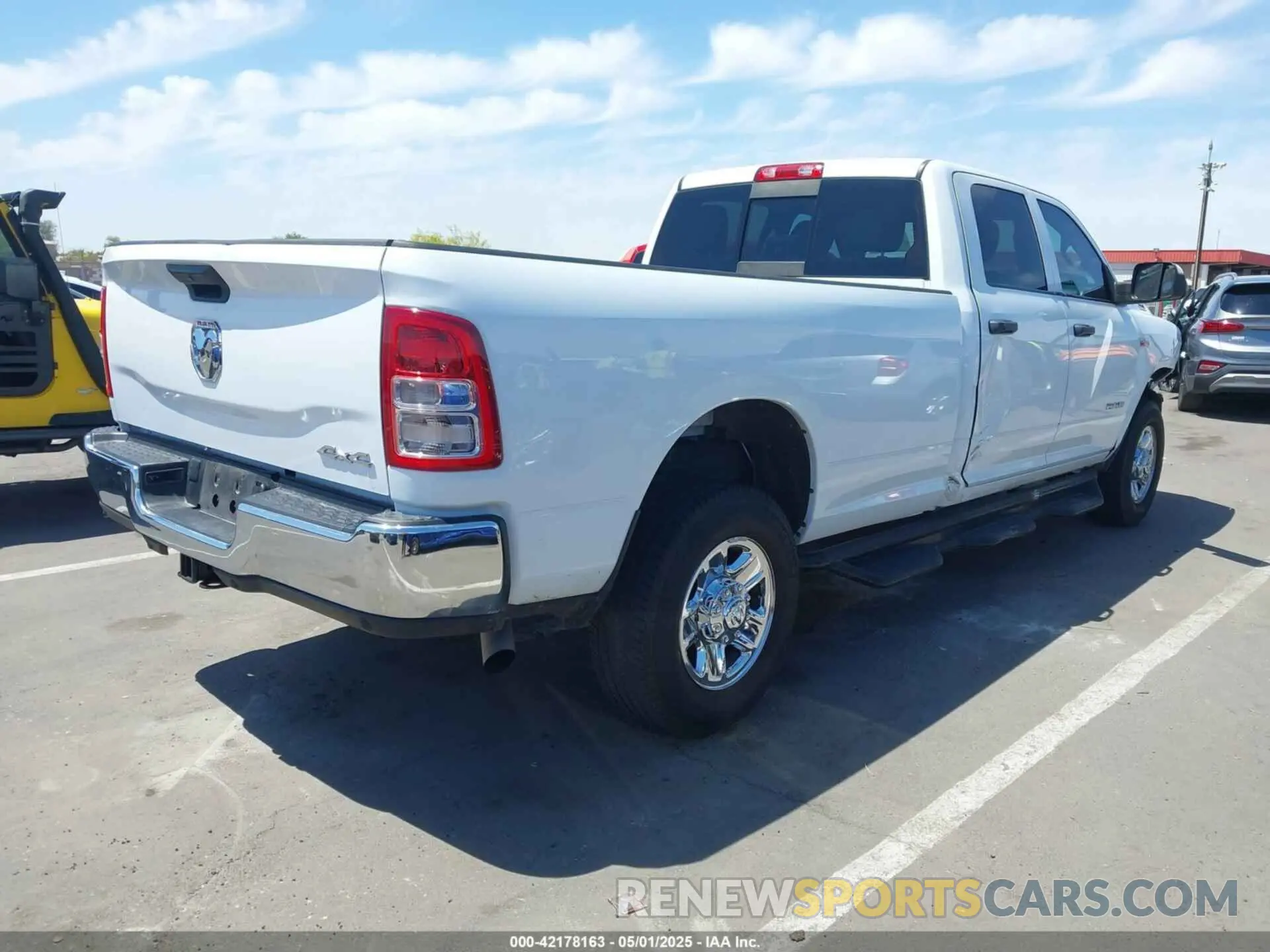 4 Photograph of a damaged car 3C6UR5HJ1KG599000 RAM 2500 2019