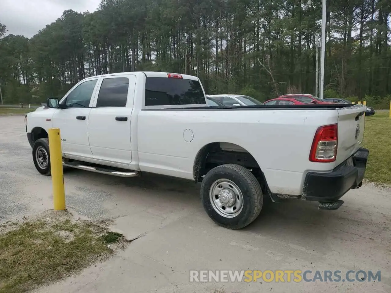 2 Photograph of a damaged car 3C6UR5HJ1KG666789 RAM 2500 2019