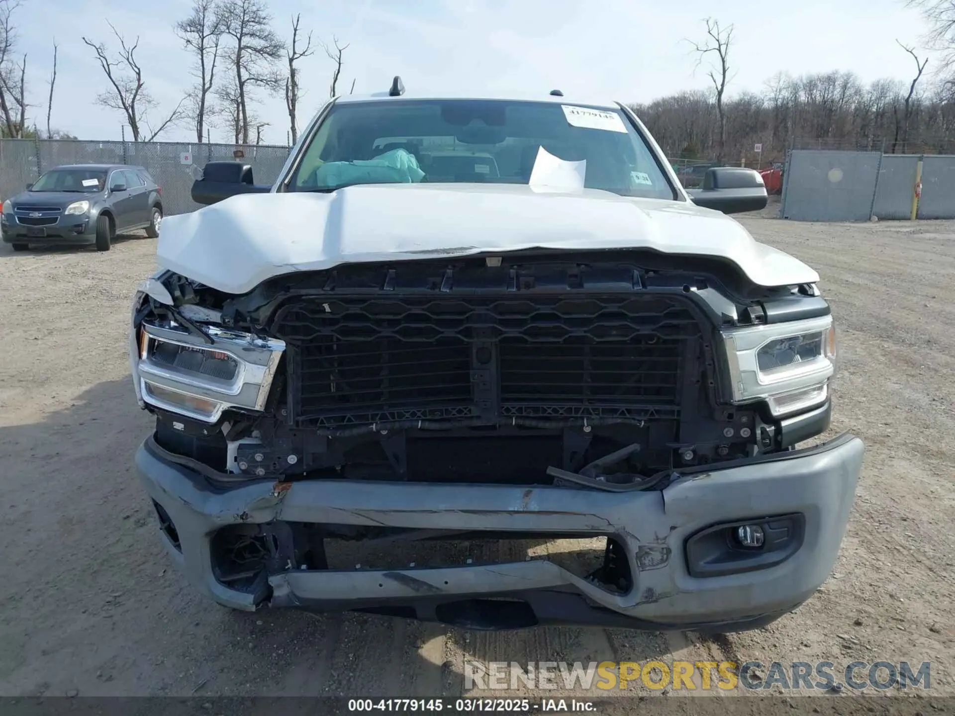 11 Photograph of a damaged car 3C6UR5HJ3KG574034 RAM 2500 2019