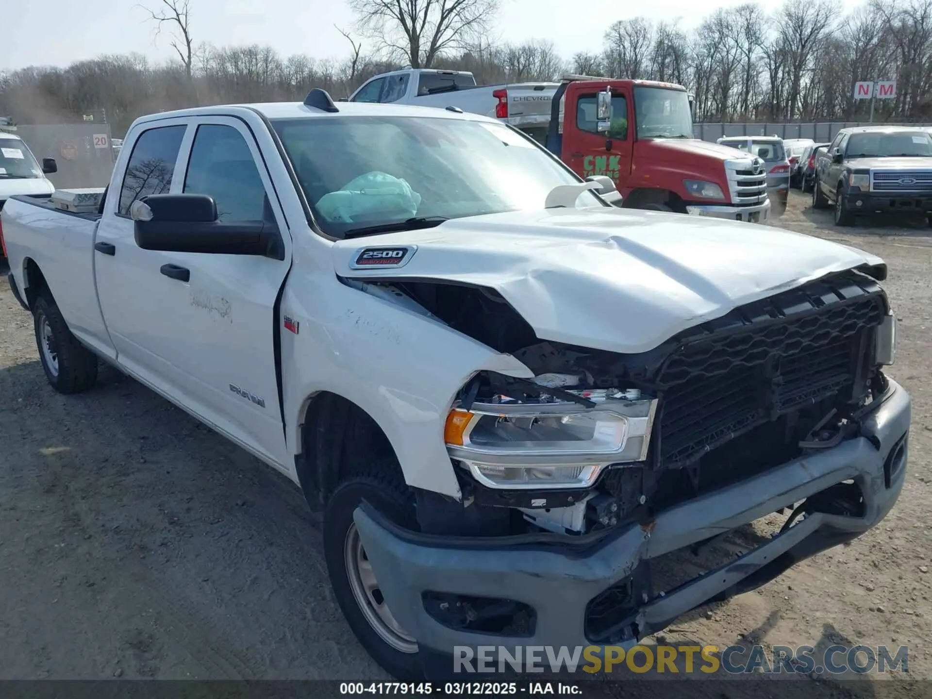 16 Photograph of a damaged car 3C6UR5HJ3KG574034 RAM 2500 2019