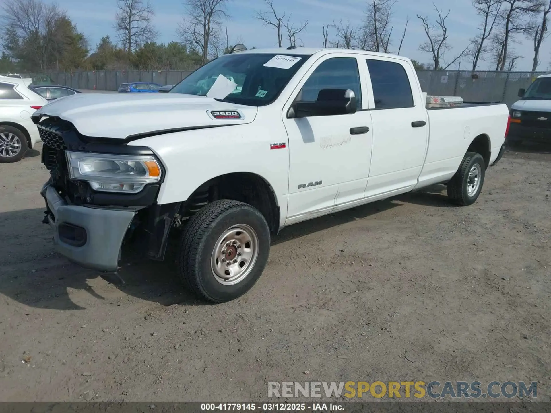 2 Photograph of a damaged car 3C6UR5HJ3KG574034 RAM 2500 2019