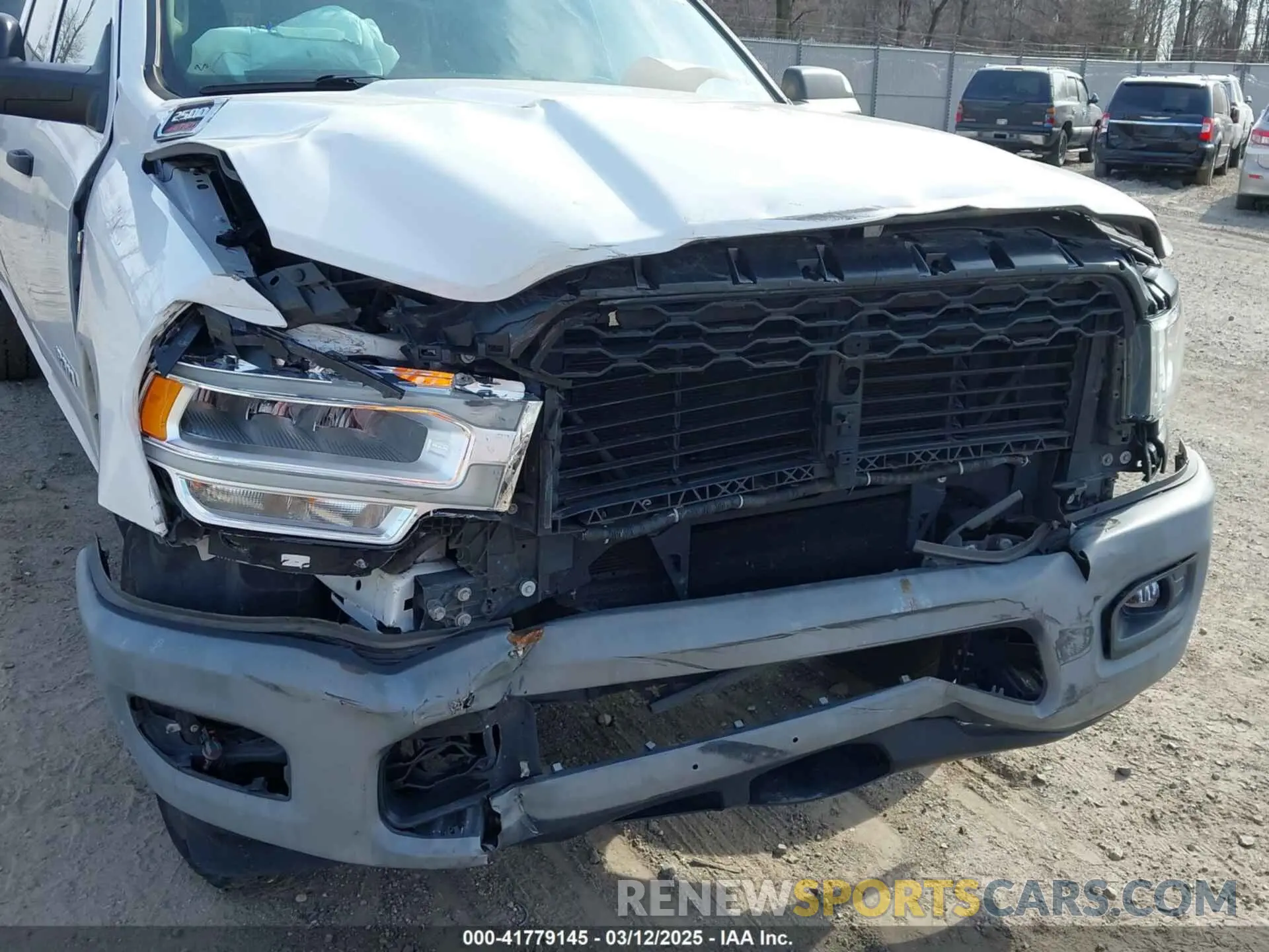 6 Photograph of a damaged car 3C6UR5HJ3KG574034 RAM 2500 2019