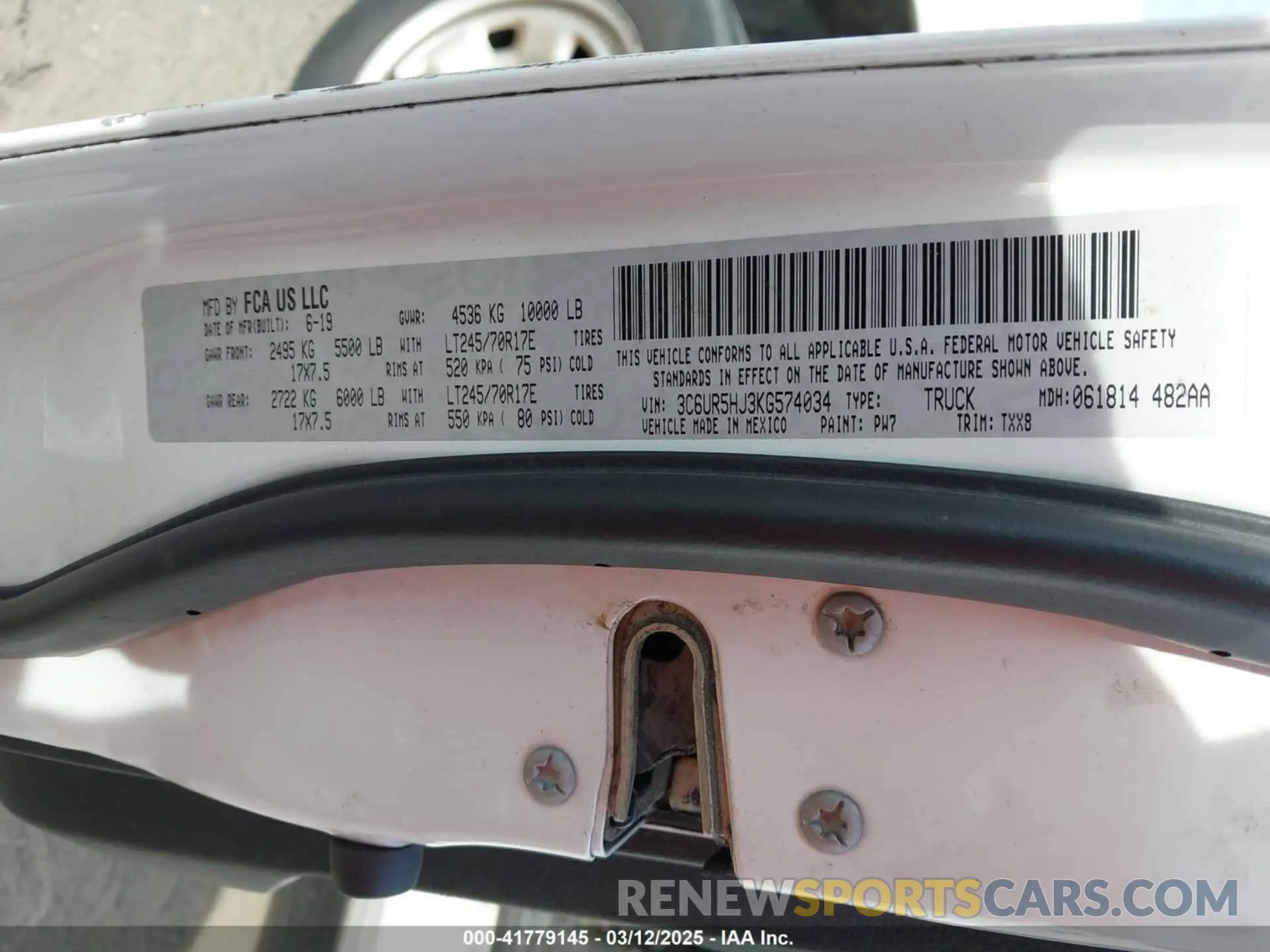9 Photograph of a damaged car 3C6UR5HJ3KG574034 RAM 2500 2019