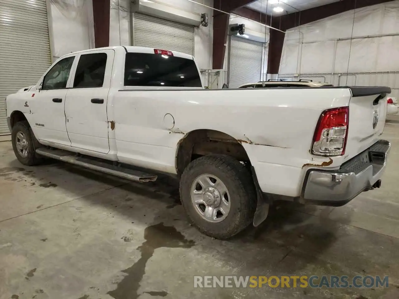 2 Photograph of a damaged car 3C6UR5HL6KG601227 RAM 2500 2019