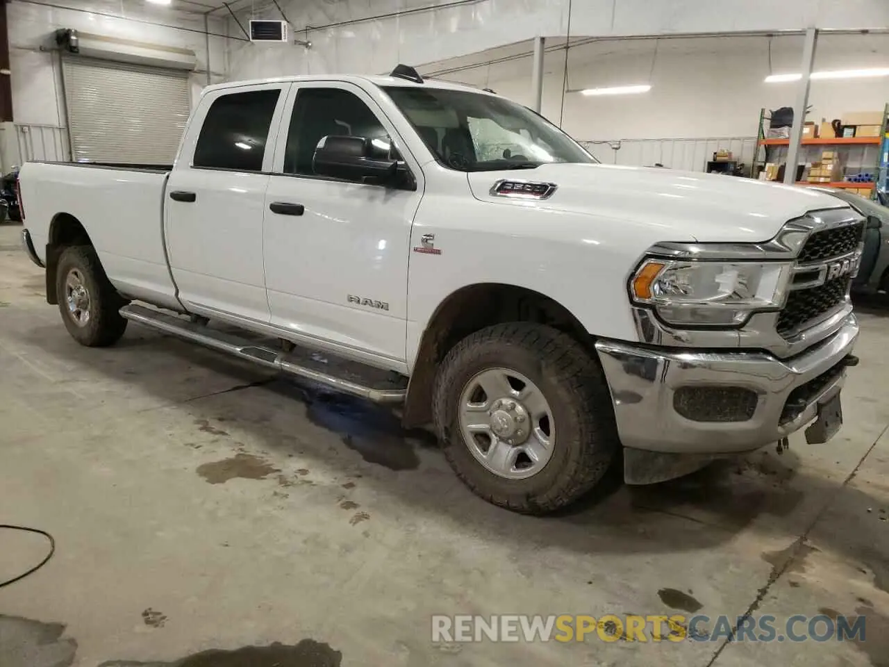 4 Photograph of a damaged car 3C6UR5HL6KG601227 RAM 2500 2019