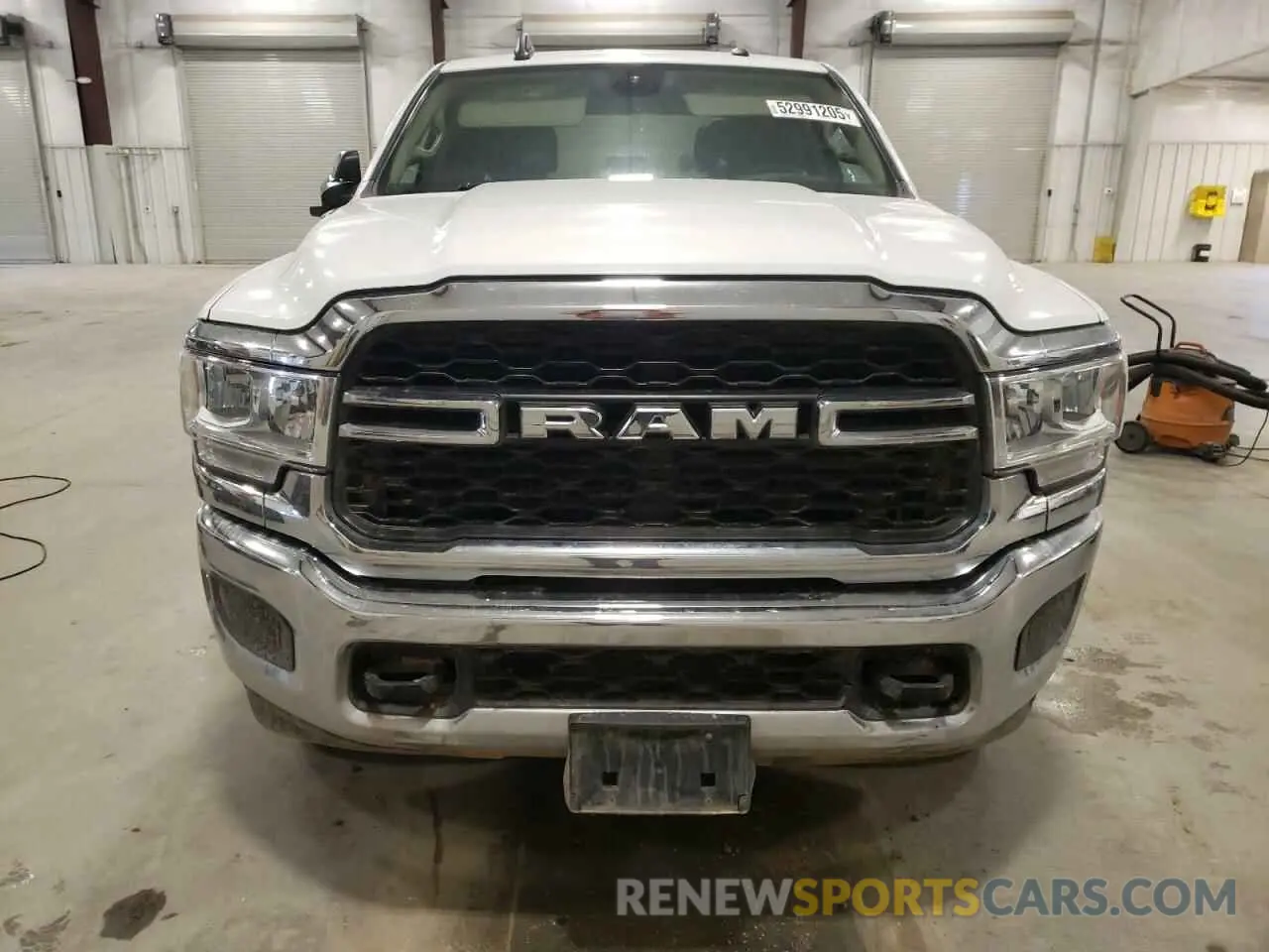 5 Photograph of a damaged car 3C6UR5HL6KG601227 RAM 2500 2019