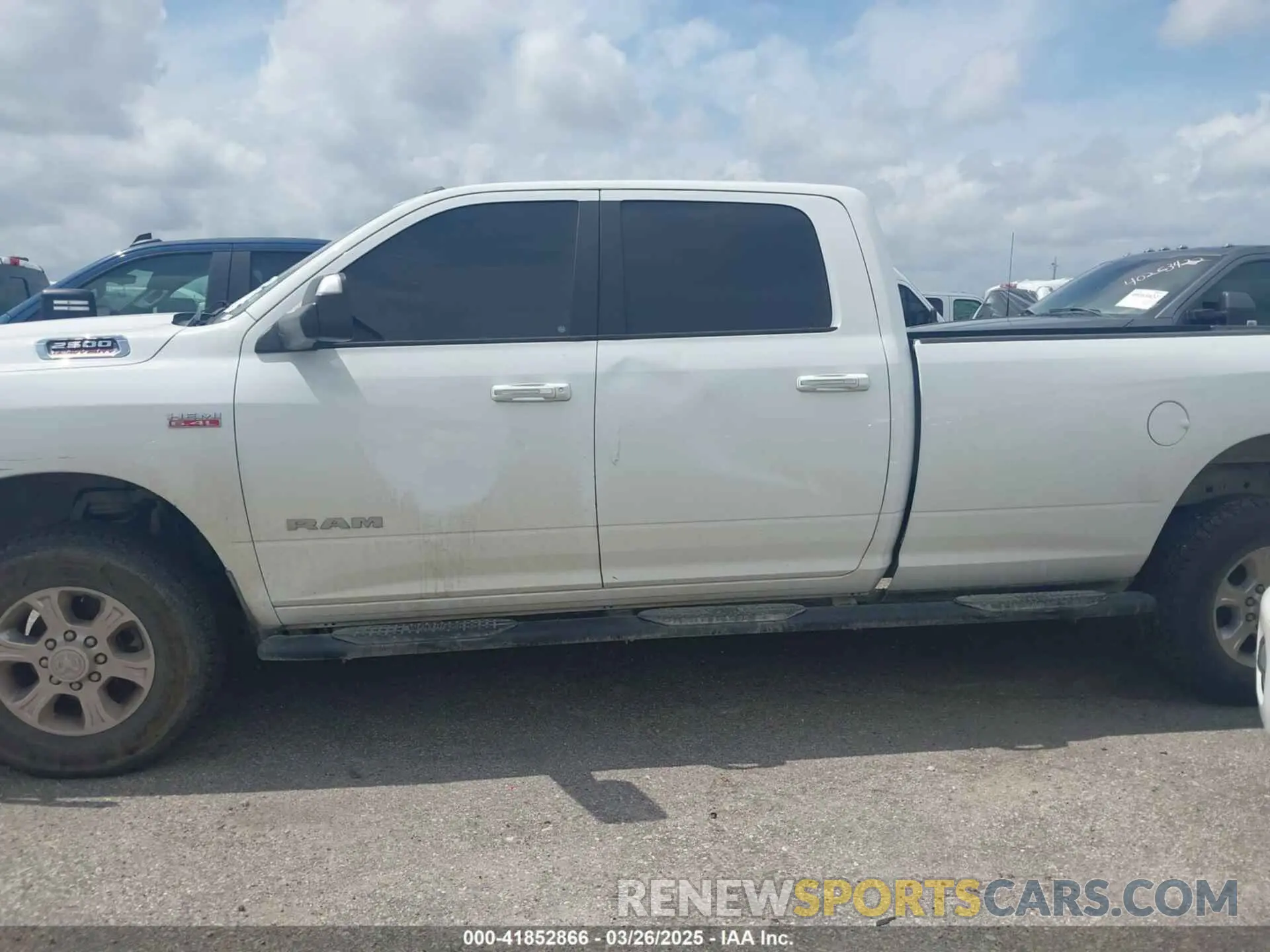 14 Photograph of a damaged car 3C6UR5JJ6KG598077 RAM 2500 2019