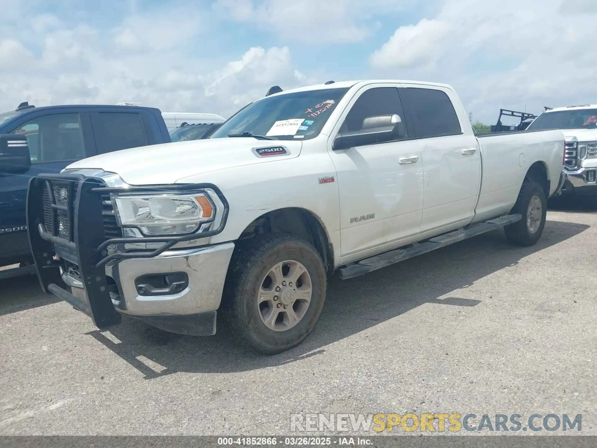 2 Photograph of a damaged car 3C6UR5JJ6KG598077 RAM 2500 2019