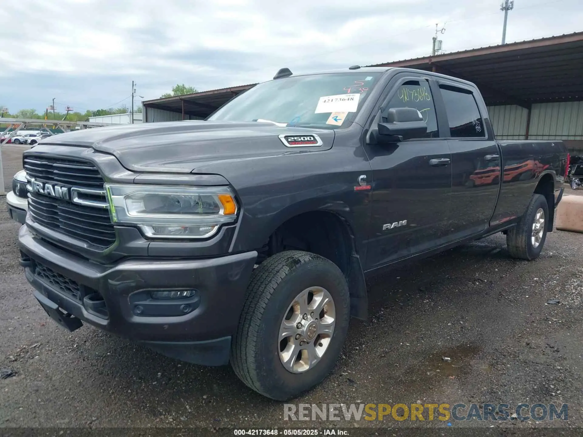 2 Photograph of a damaged car 3C6UR5JL0KG690383 RAM 2500 2019