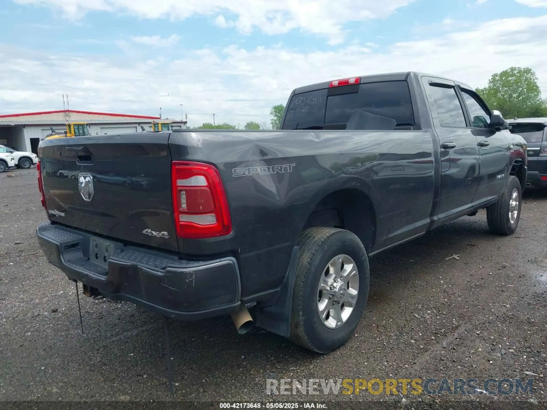 4 Photograph of a damaged car 3C6UR5JL0KG690383 RAM 2500 2019