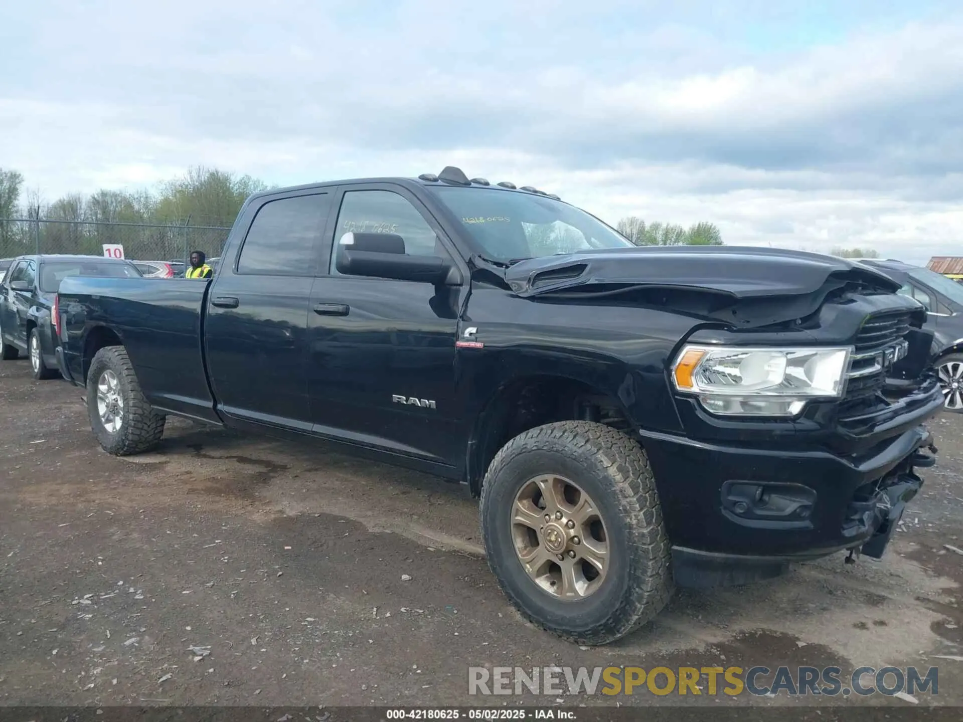 1 Photograph of a damaged car 3C6UR5JL0KG700152 RAM 2500 2019