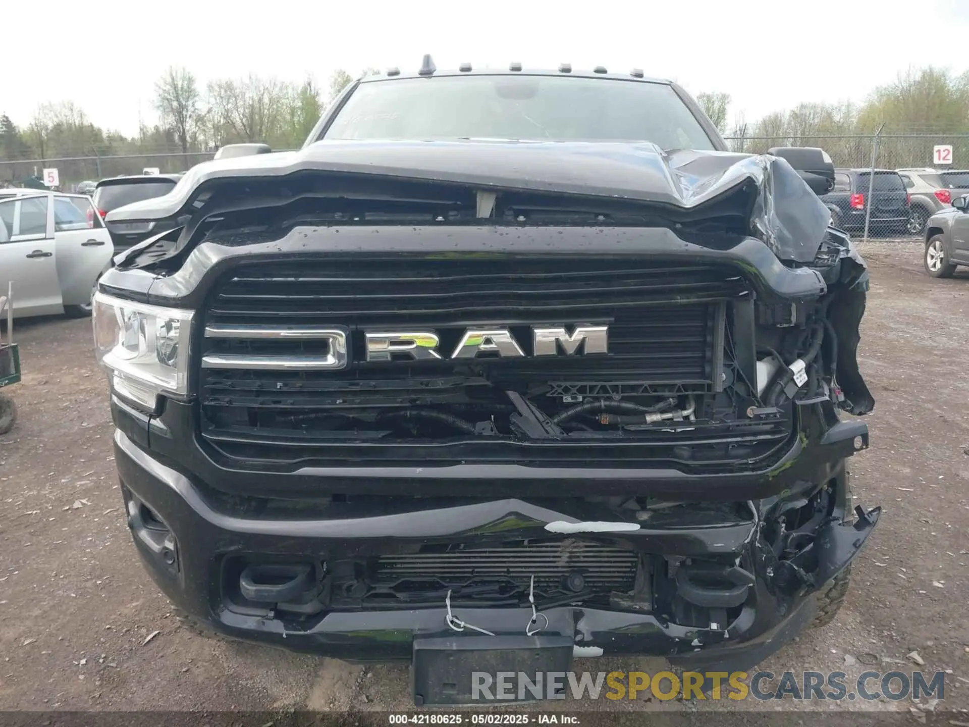 12 Photograph of a damaged car 3C6UR5JL0KG700152 RAM 2500 2019