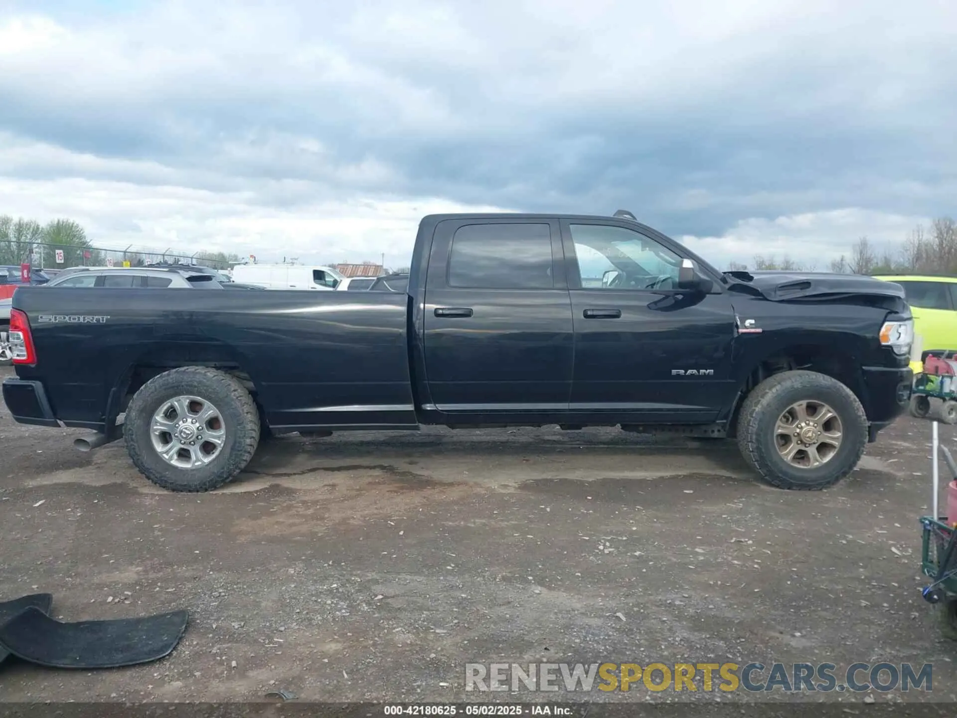 13 Photograph of a damaged car 3C6UR5JL0KG700152 RAM 2500 2019