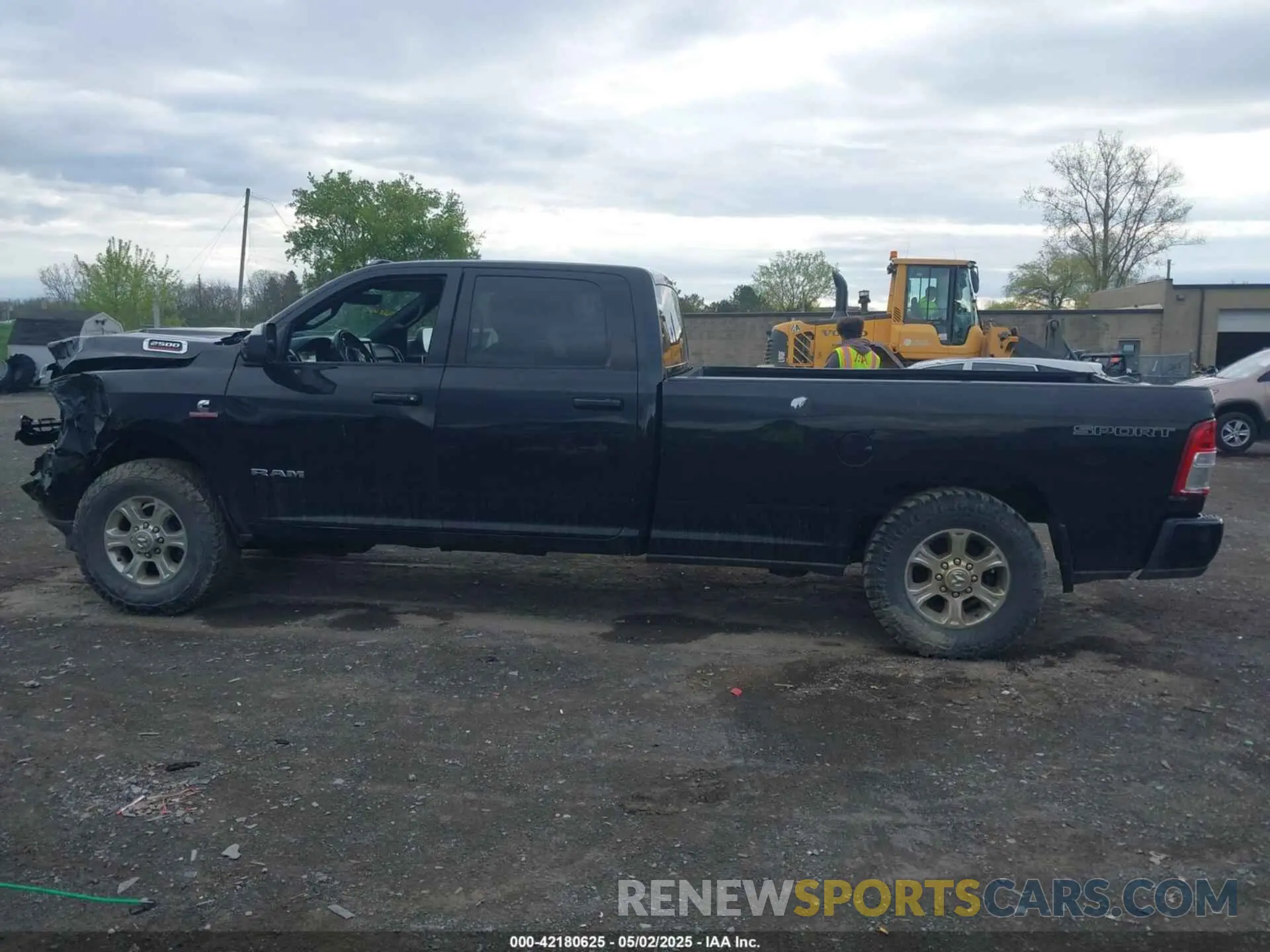 14 Photograph of a damaged car 3C6UR5JL0KG700152 RAM 2500 2019