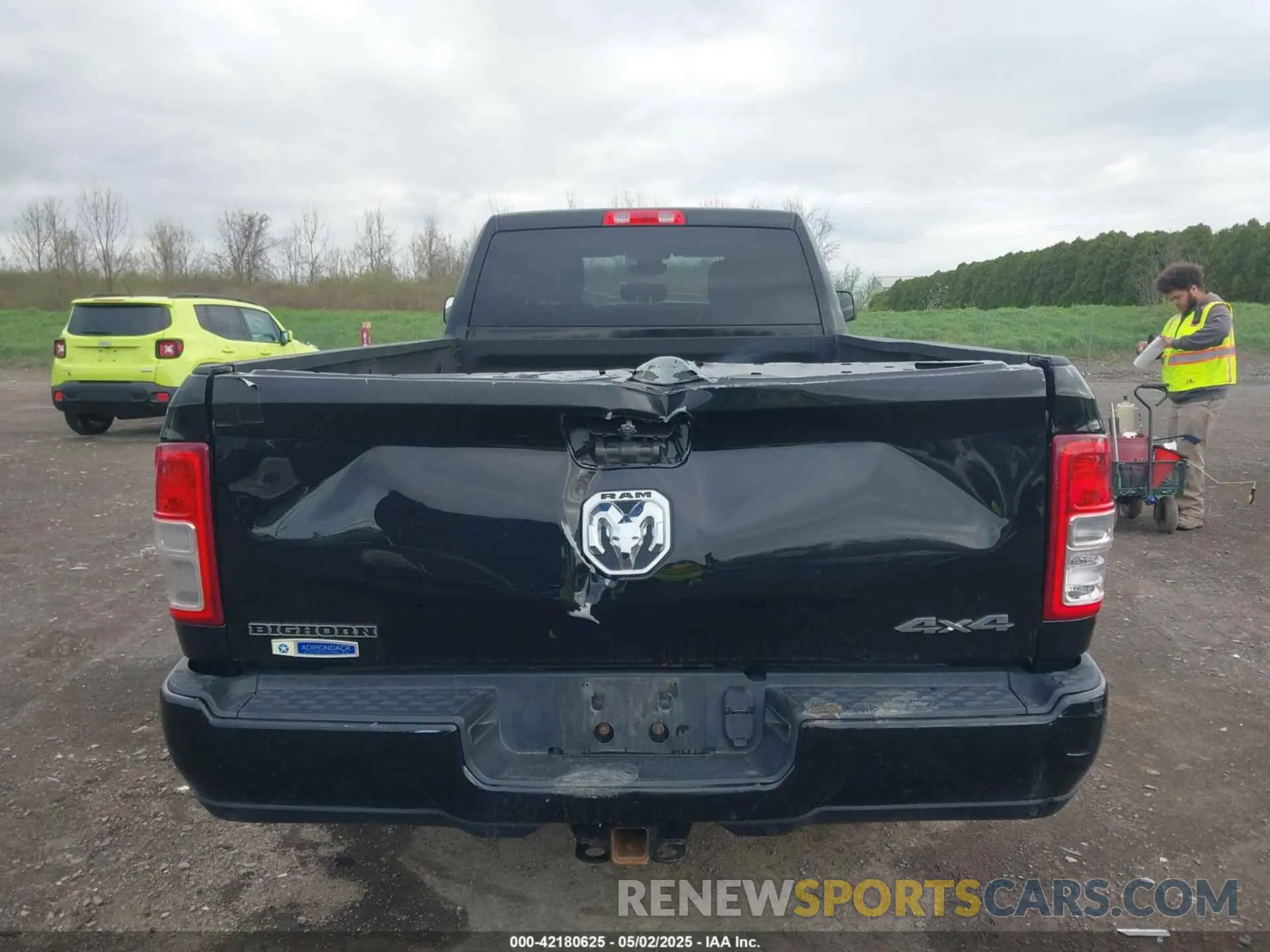 16 Photograph of a damaged car 3C6UR5JL0KG700152 RAM 2500 2019