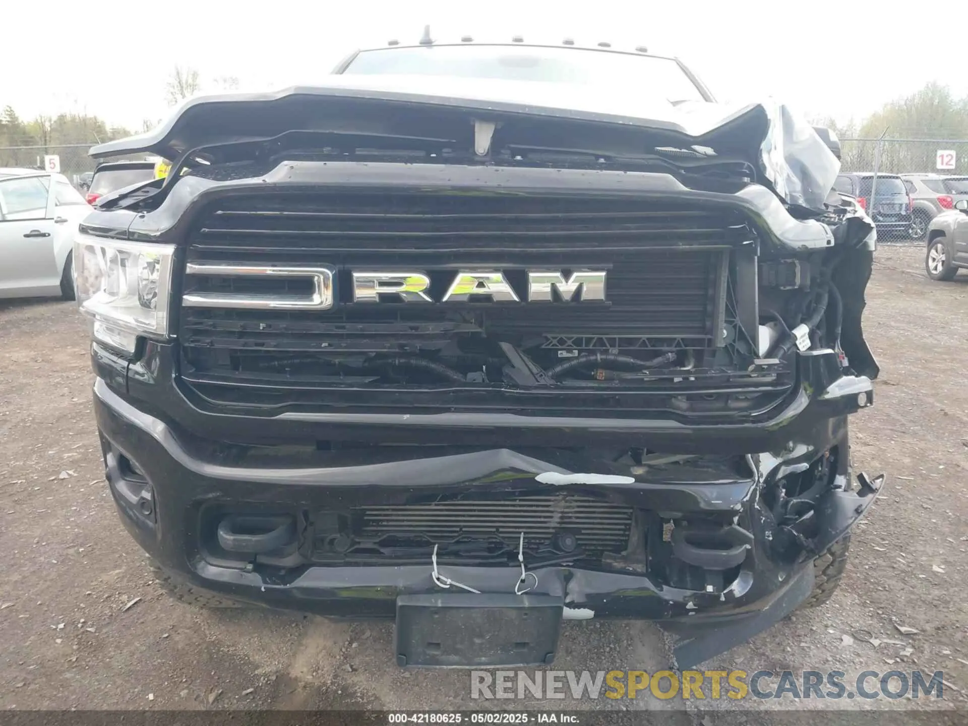6 Photograph of a damaged car 3C6UR5JL0KG700152 RAM 2500 2019