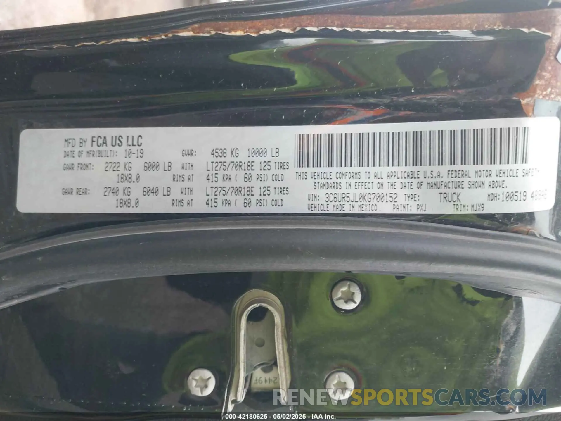 9 Photograph of a damaged car 3C6UR5JL0KG700152 RAM 2500 2019