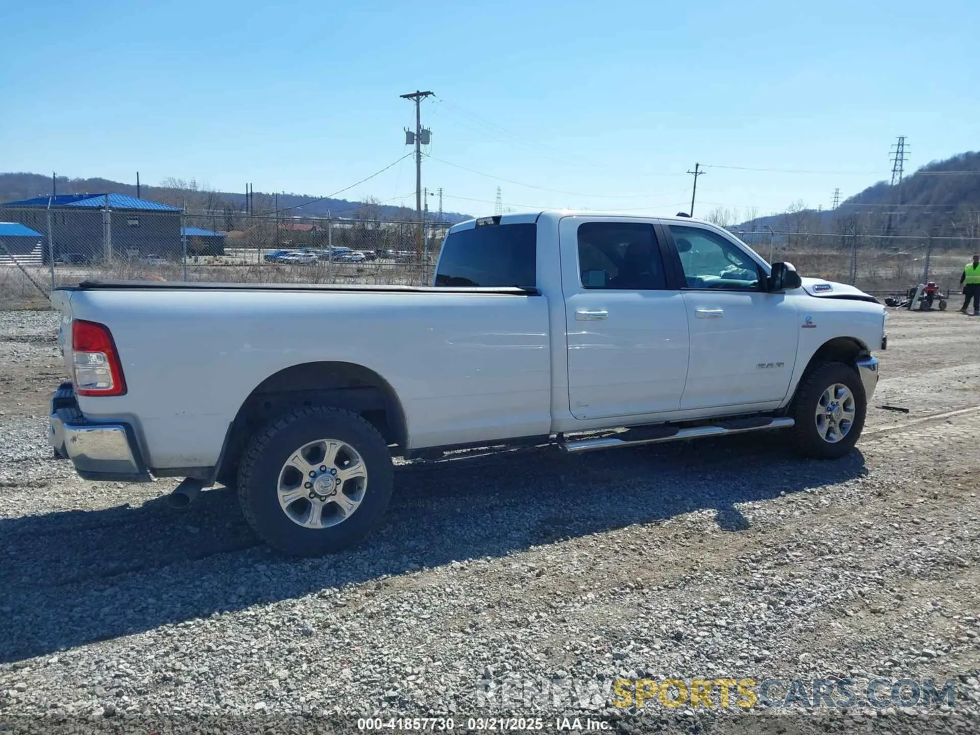 14 Photograph of a damaged car 3C6UR5JL1KG601176 RAM 2500 2019