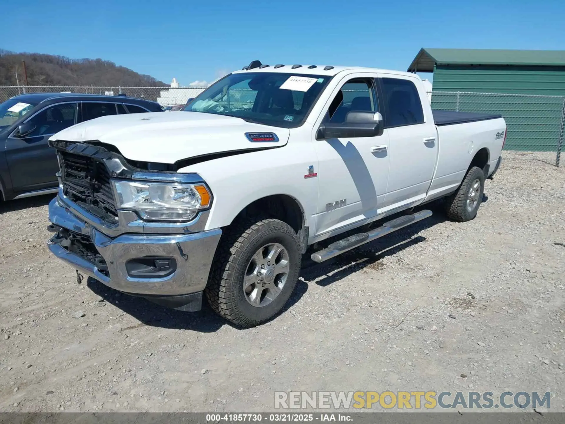 2 Photograph of a damaged car 3C6UR5JL1KG601176 RAM 2500 2019