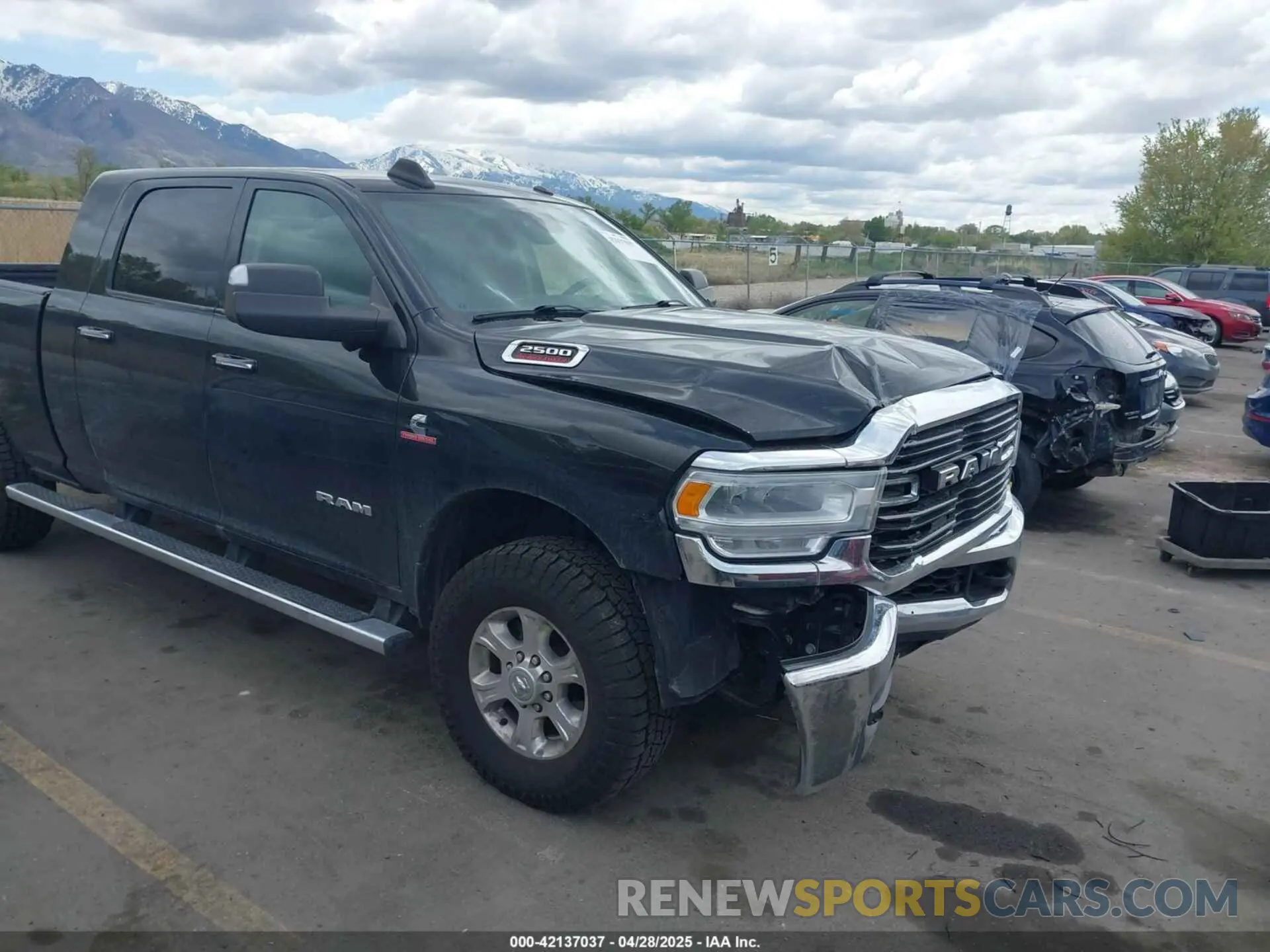 1 Photograph of a damaged car 3C6UR5ML4KG635799 RAM 2500 2019