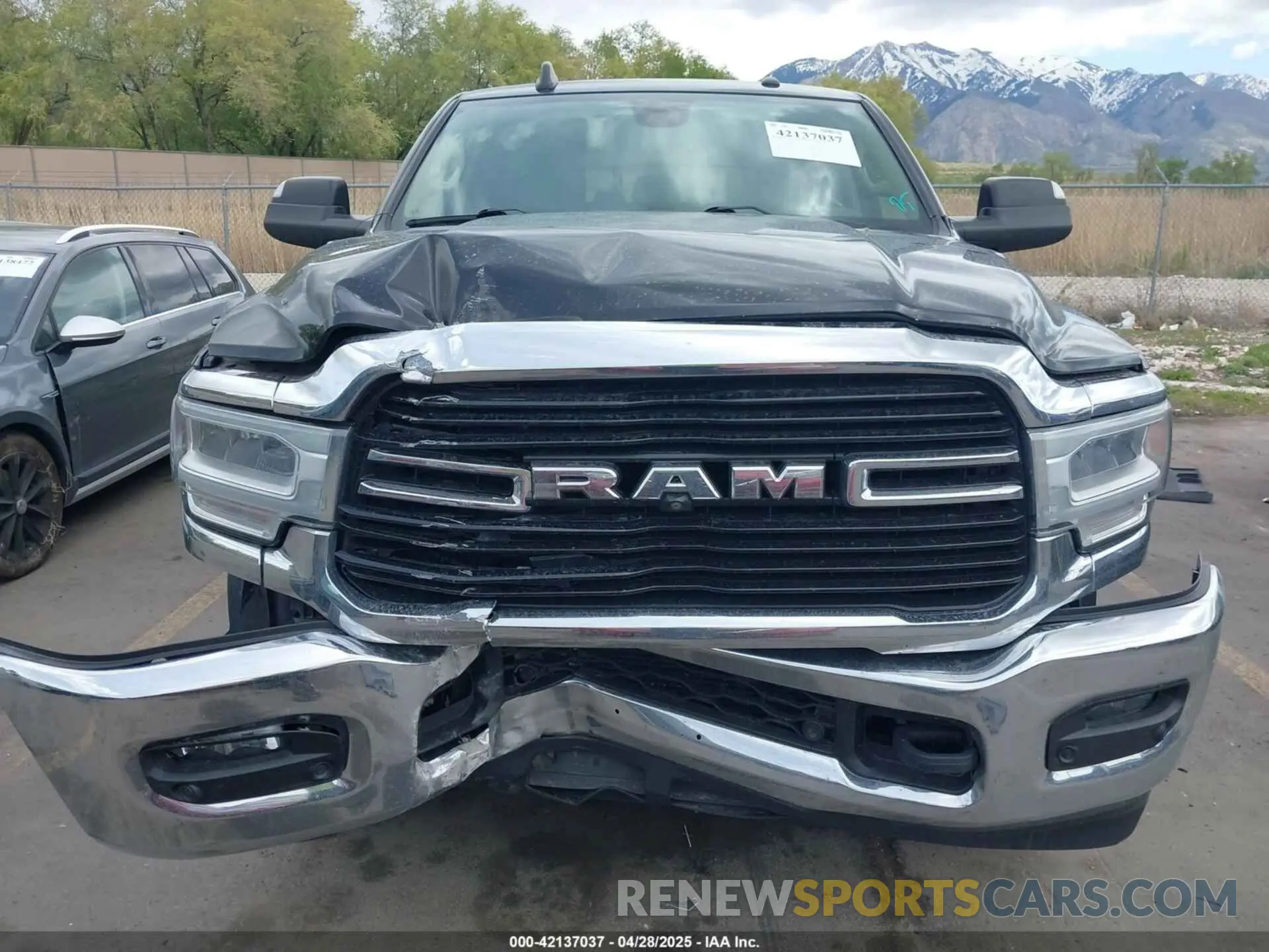 12 Photograph of a damaged car 3C6UR5ML4KG635799 RAM 2500 2019