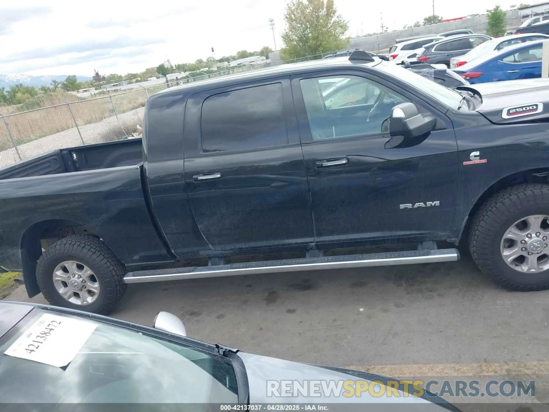 13 Photograph of a damaged car 3C6UR5ML4KG635799 RAM 2500 2019
