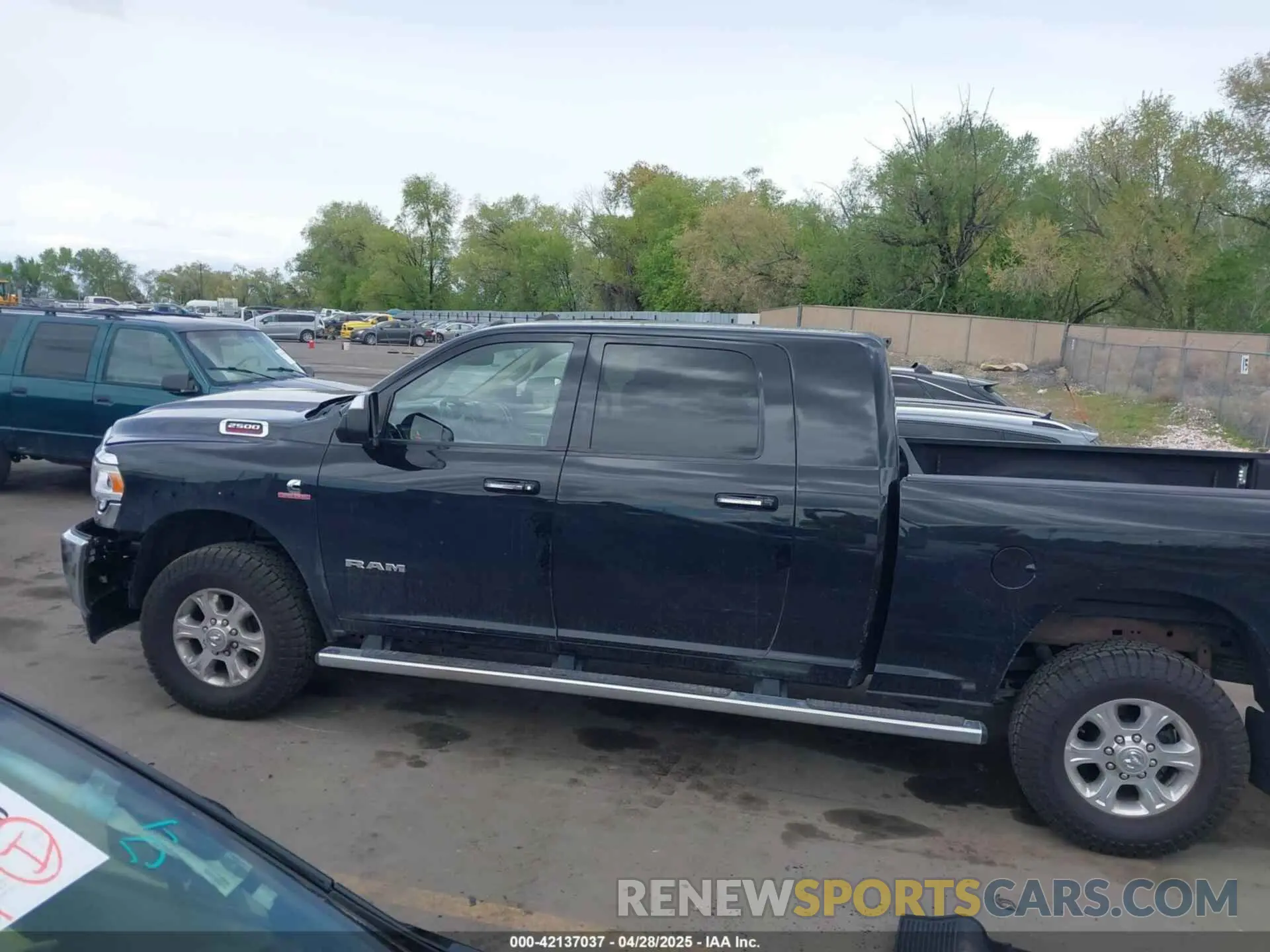 14 Photograph of a damaged car 3C6UR5ML4KG635799 RAM 2500 2019