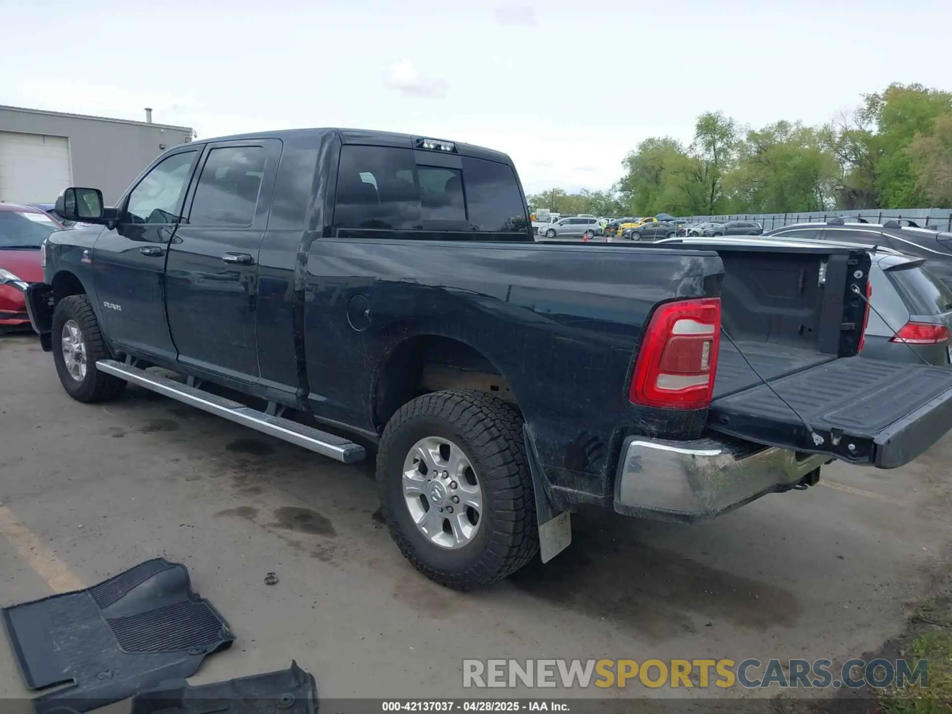 3 Photograph of a damaged car 3C6UR5ML4KG635799 RAM 2500 2019
