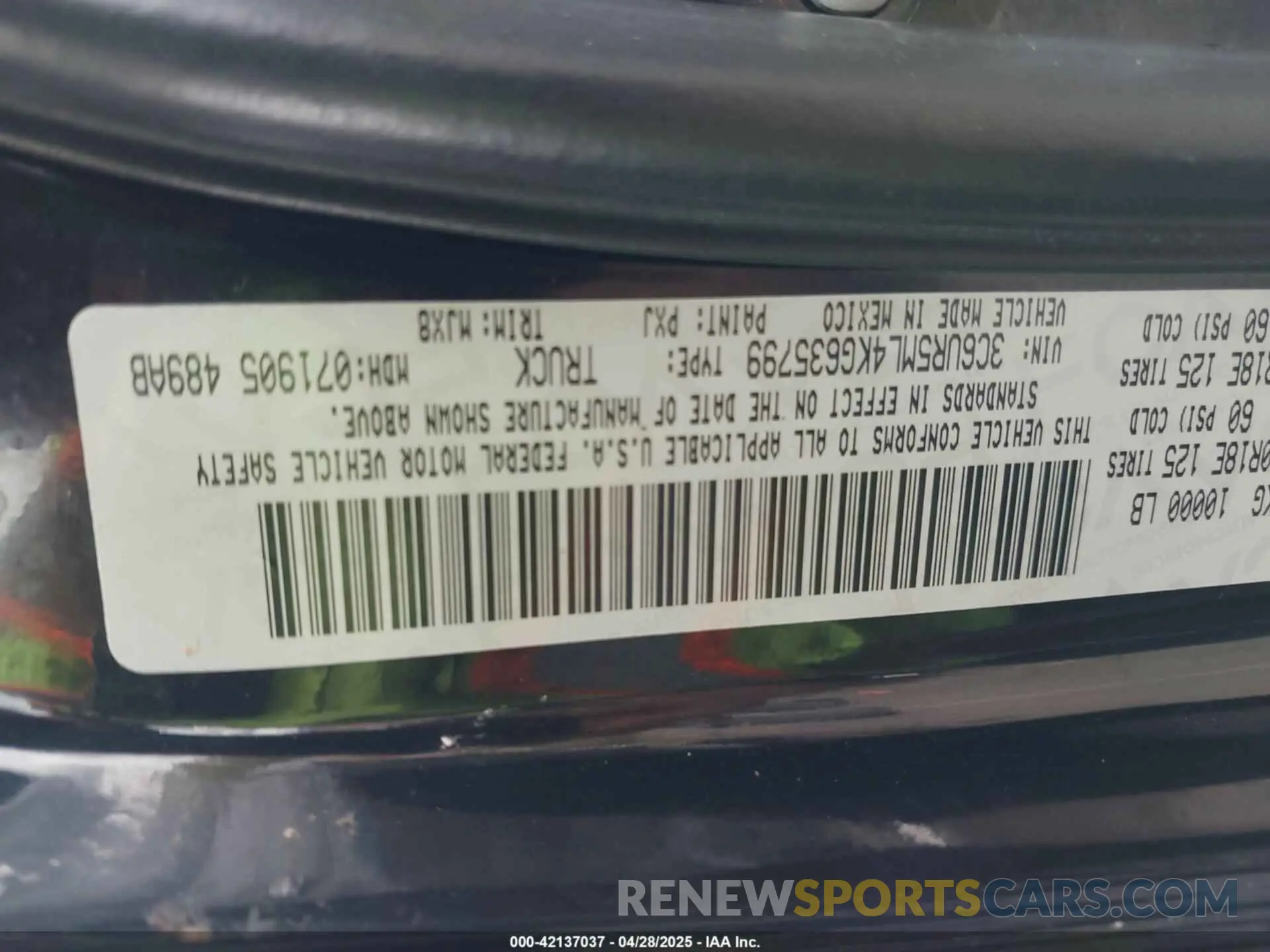 9 Photograph of a damaged car 3C6UR5ML4KG635799 RAM 2500 2019