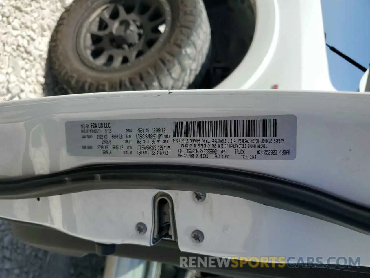 12 Photograph of a damaged car 3C6UR5NL2KG593602 RAM 2500 2019