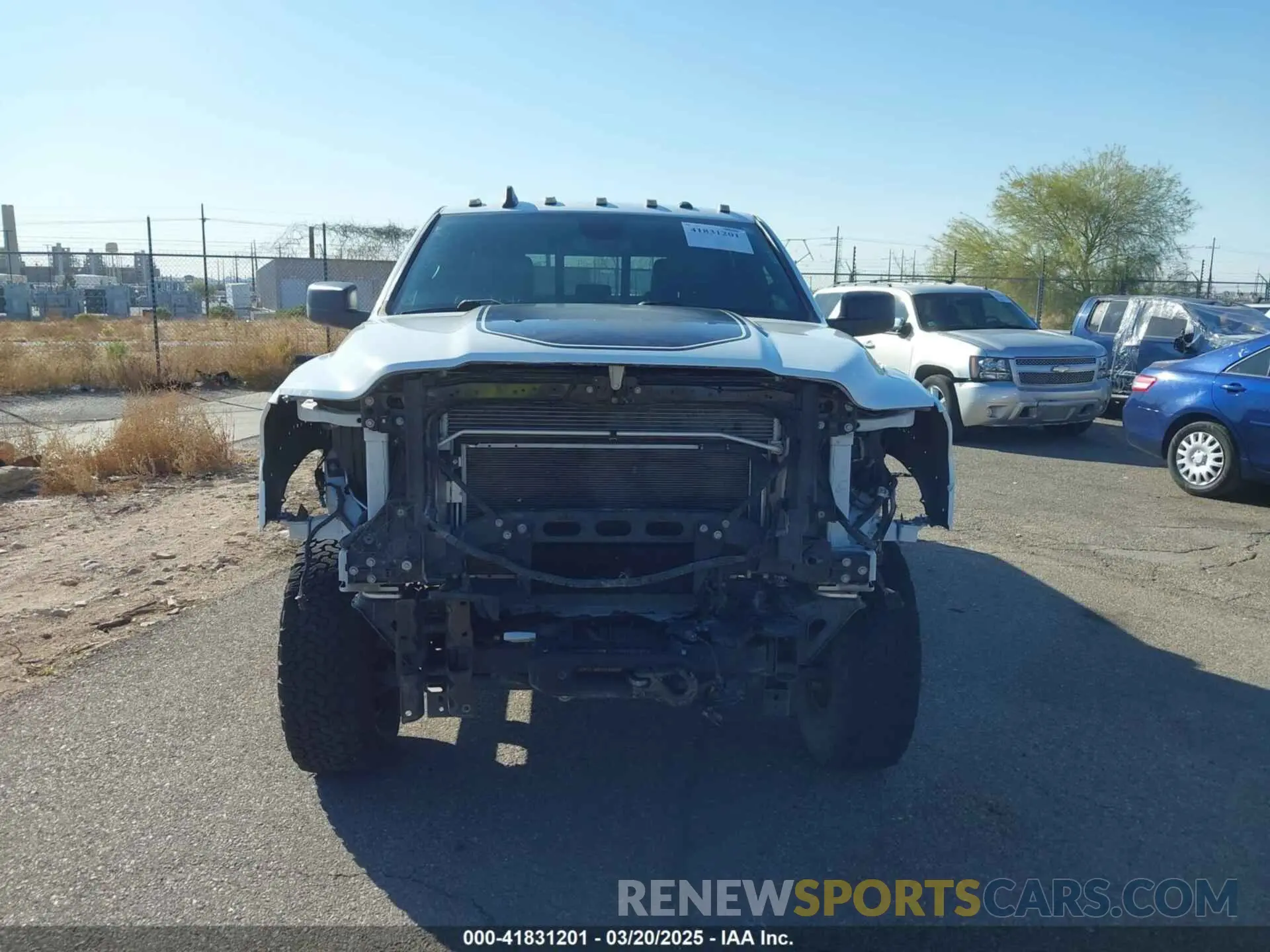 13 Photograph of a damaged car 3C6TR5EJ4LG274651 RAM 2500 2020