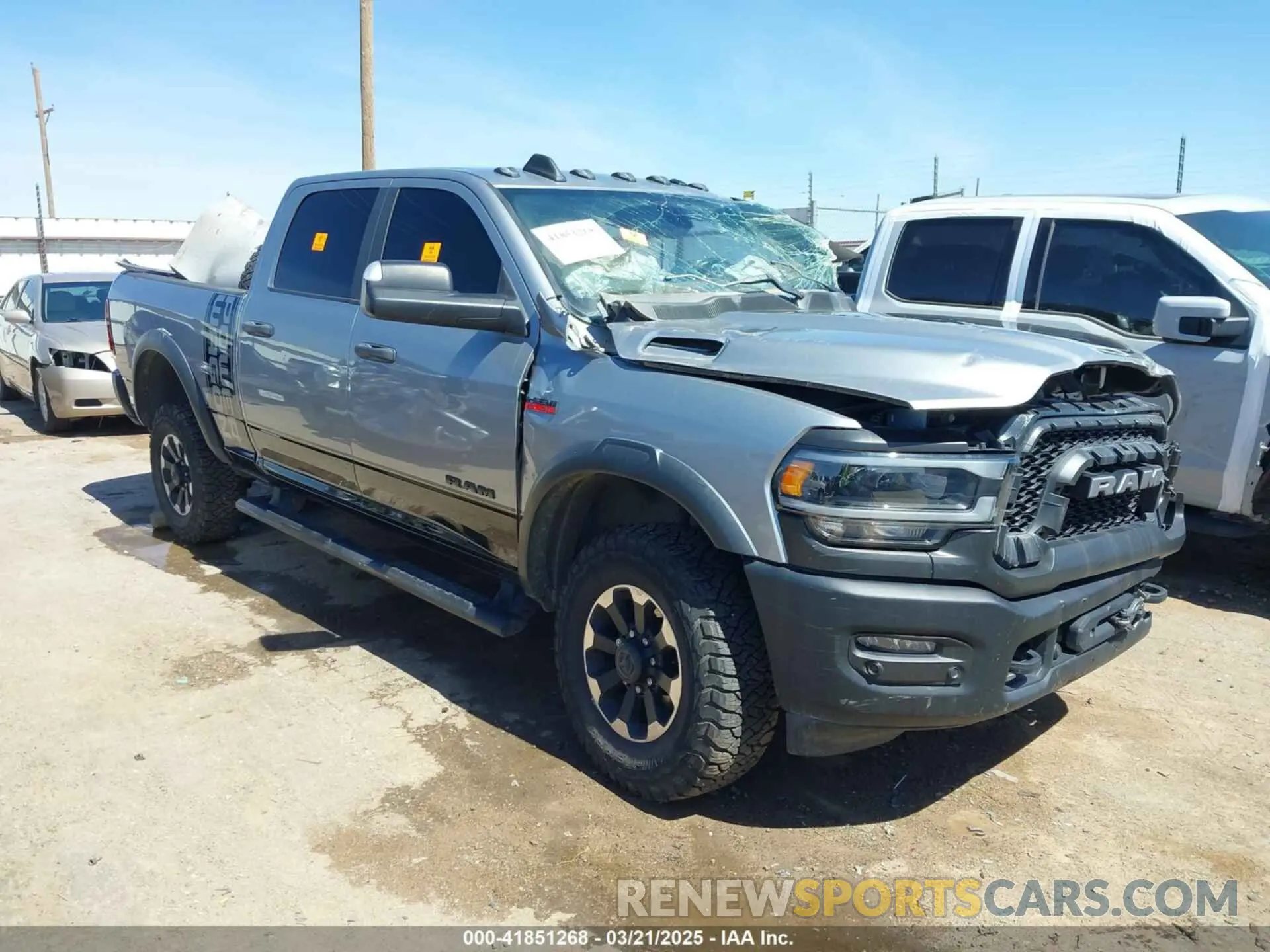 1 Photograph of a damaged car 3C6TR5EJ5LG112074 RAM 2500 2020