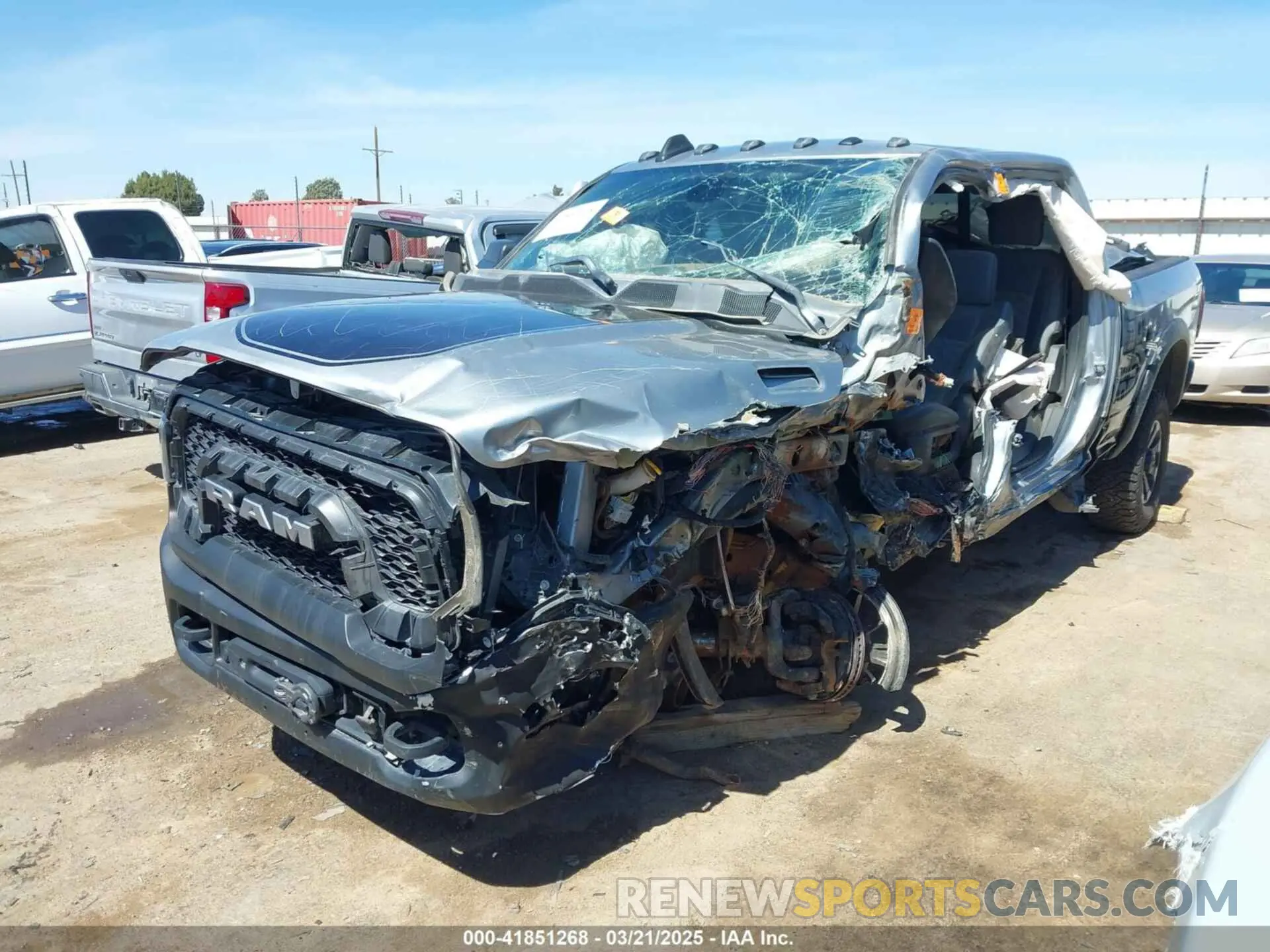 2 Photograph of a damaged car 3C6TR5EJ5LG112074 RAM 2500 2020