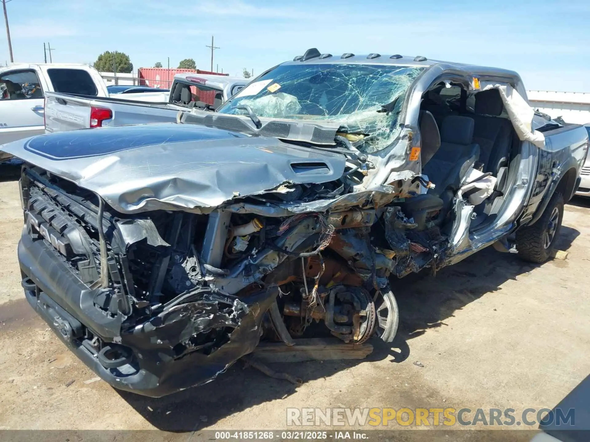 6 Photograph of a damaged car 3C6TR5EJ5LG112074 RAM 2500 2020