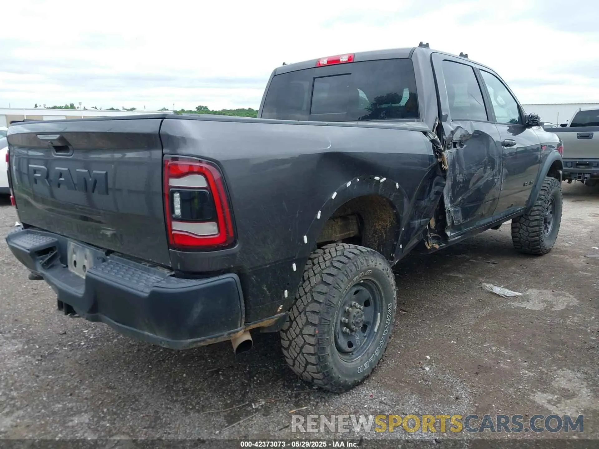 4 Photograph of a damaged car 3C6TR5EJ6LG303485 RAM 2500 2020