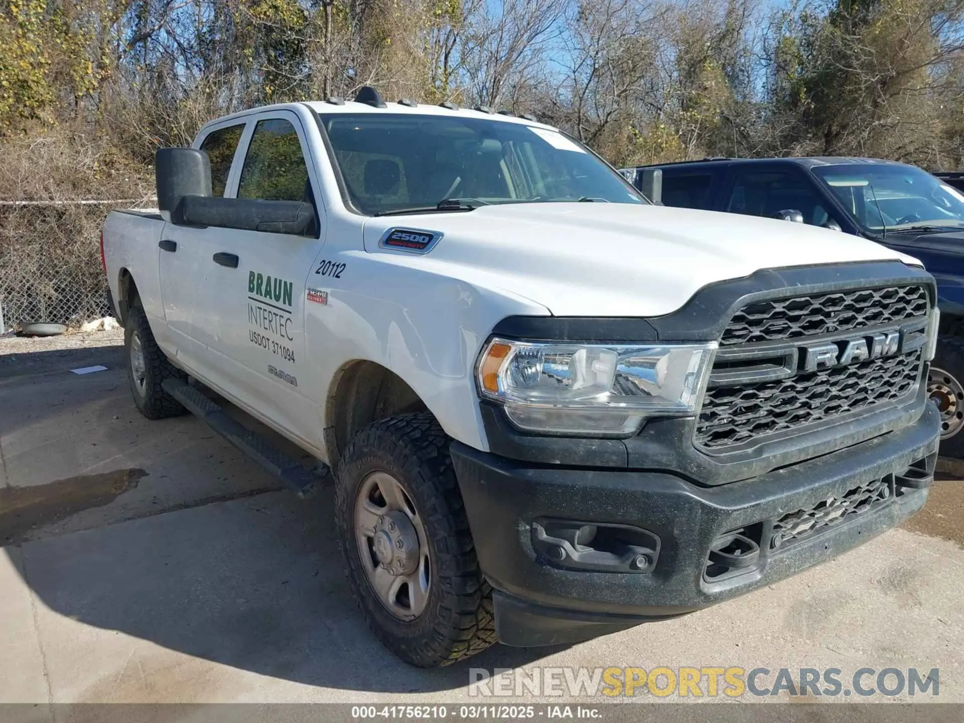 1 Photograph of a damaged car 3C6UR5CJ3LG187945 RAM 2500 2020