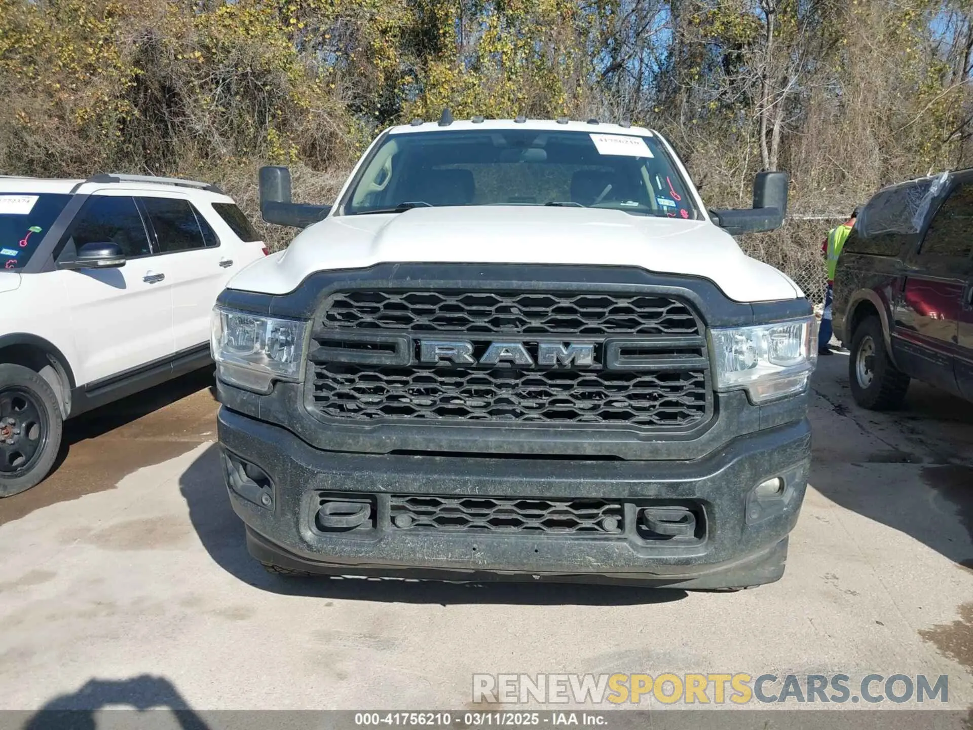 11 Photograph of a damaged car 3C6UR5CJ3LG187945 RAM 2500 2020