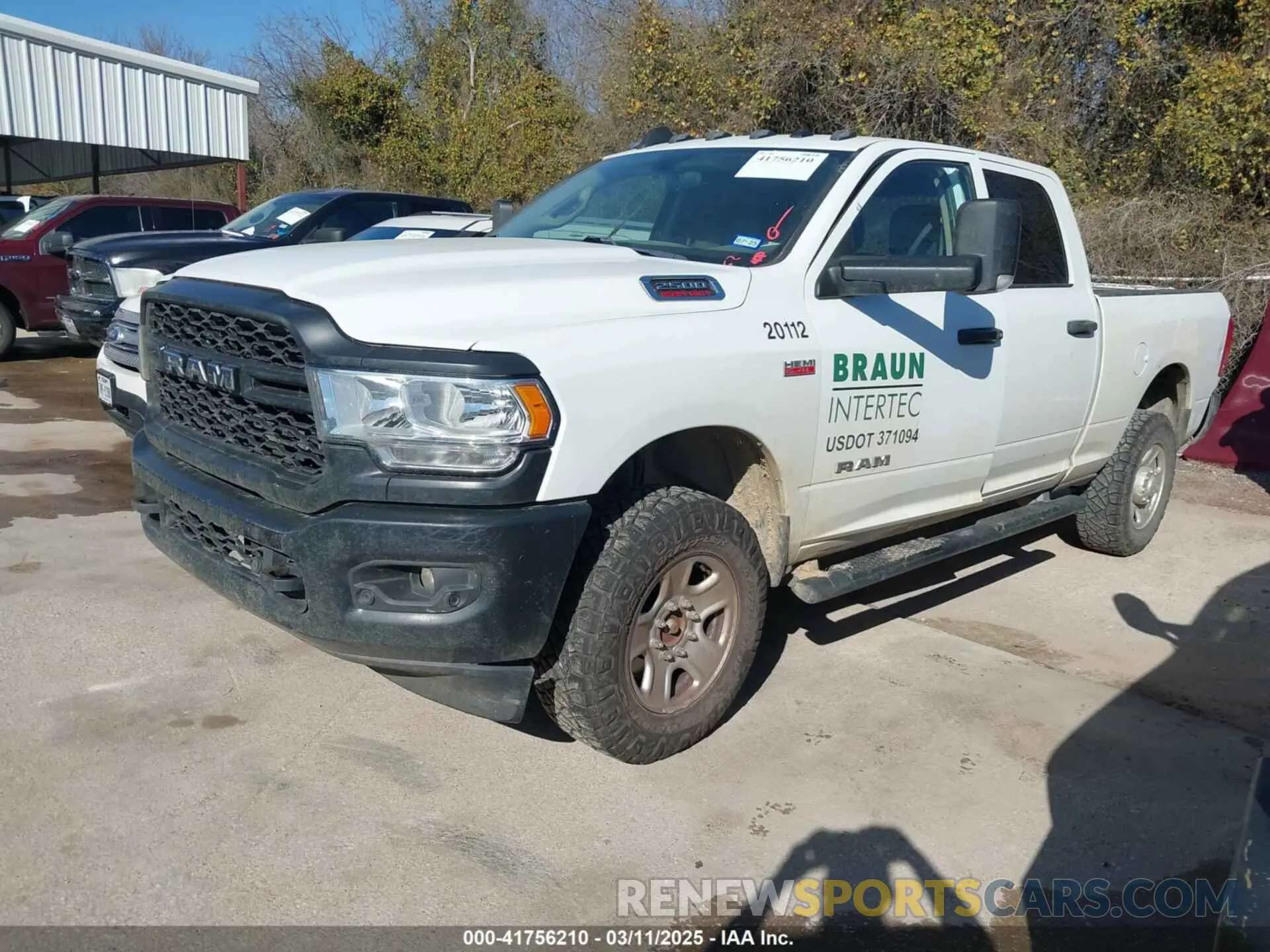 2 Photograph of a damaged car 3C6UR5CJ3LG187945 RAM 2500 2020