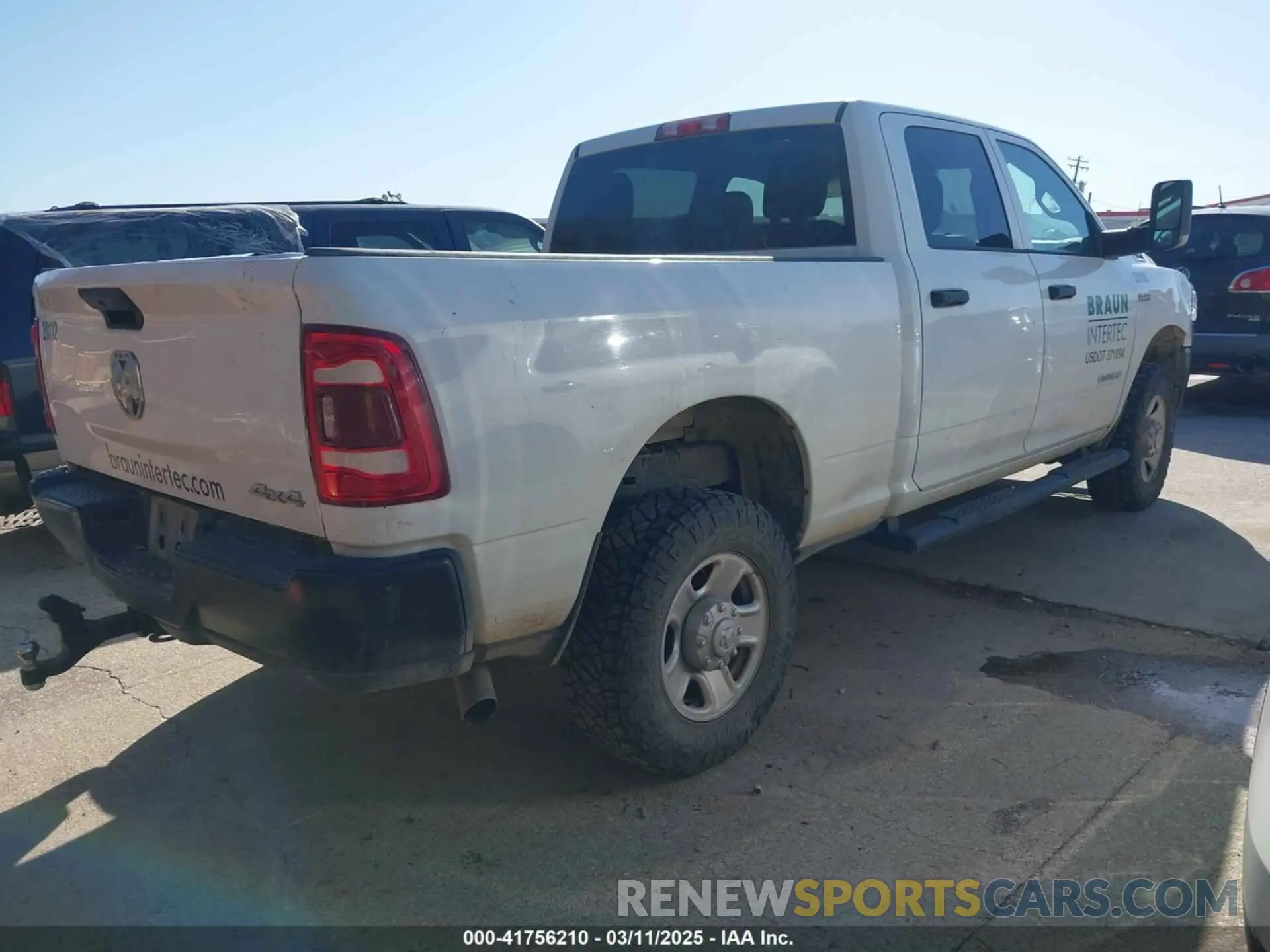 4 Photograph of a damaged car 3C6UR5CJ3LG187945 RAM 2500 2020