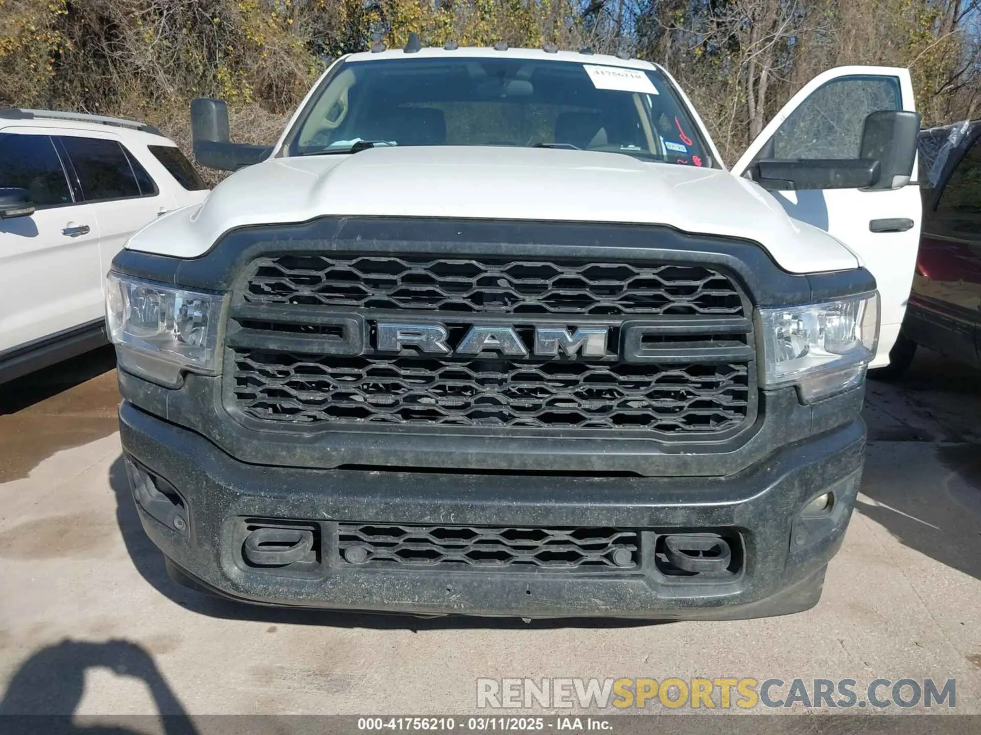 6 Photograph of a damaged car 3C6UR5CJ3LG187945 RAM 2500 2020