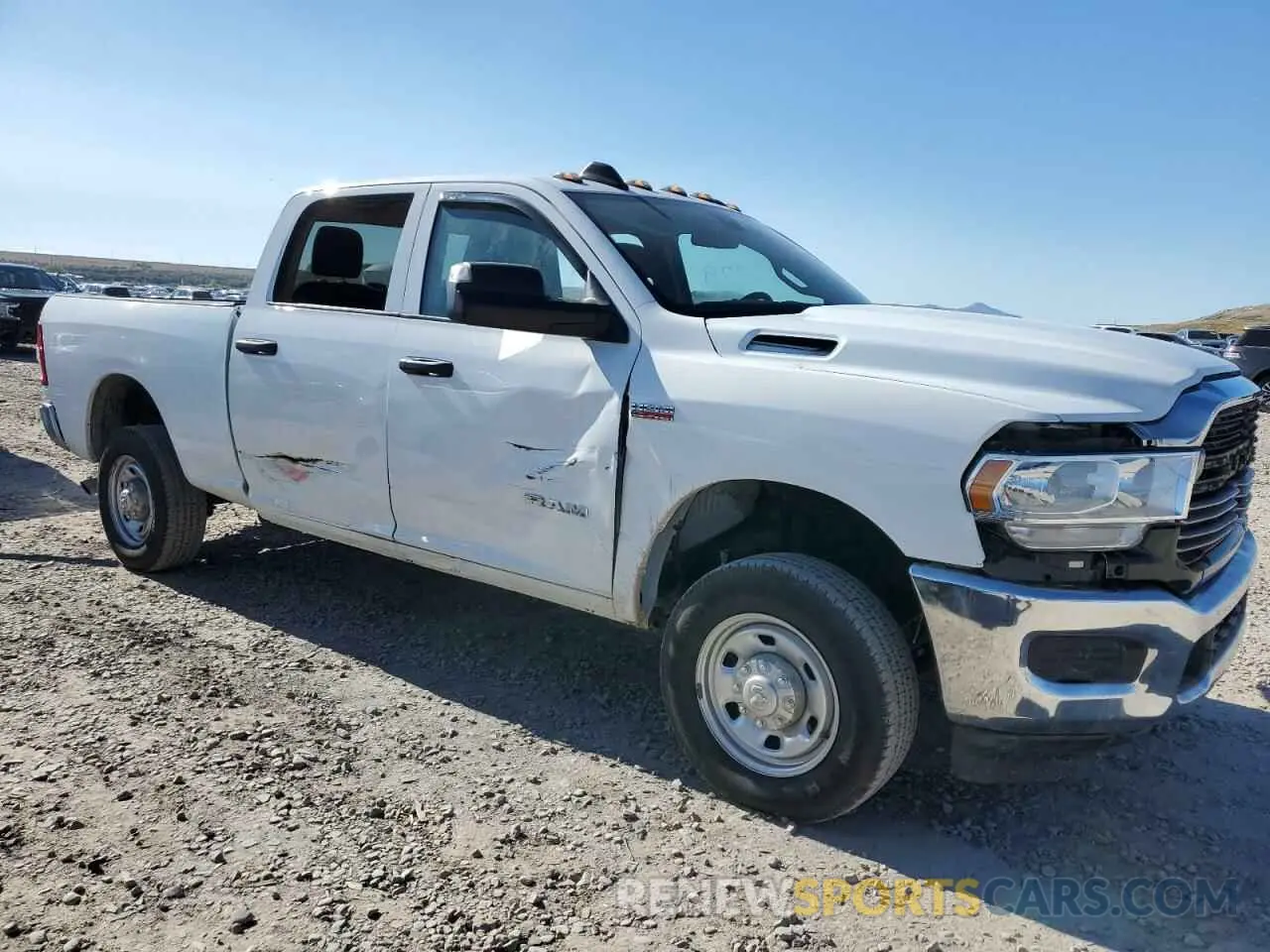 4 Photograph of a damaged car 3C6UR5CJ3LG275880 RAM 2500 2020