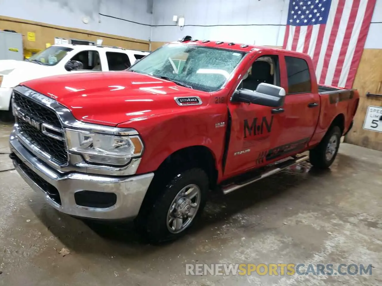 1 Photograph of a damaged car 3C6UR5CJ4LG235307 RAM 2500 2020