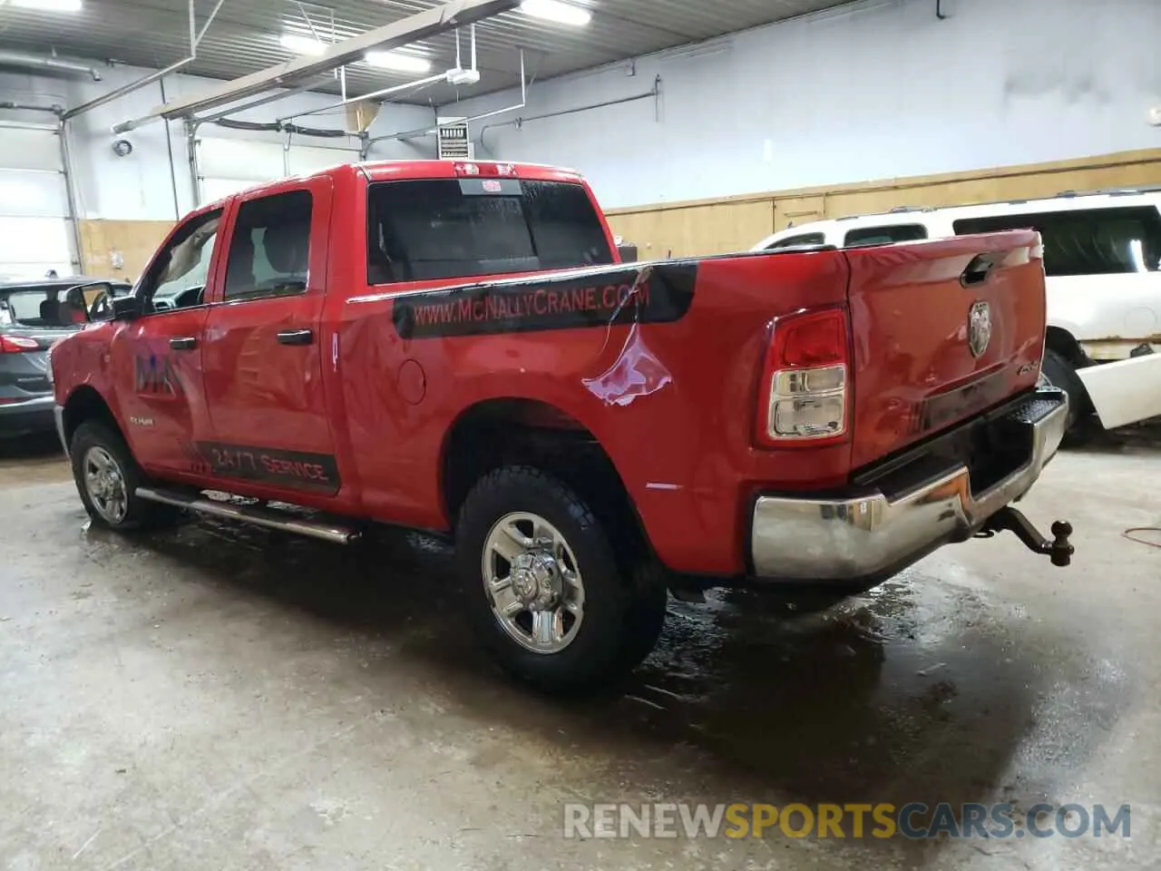 2 Photograph of a damaged car 3C6UR5CJ4LG235307 RAM 2500 2020